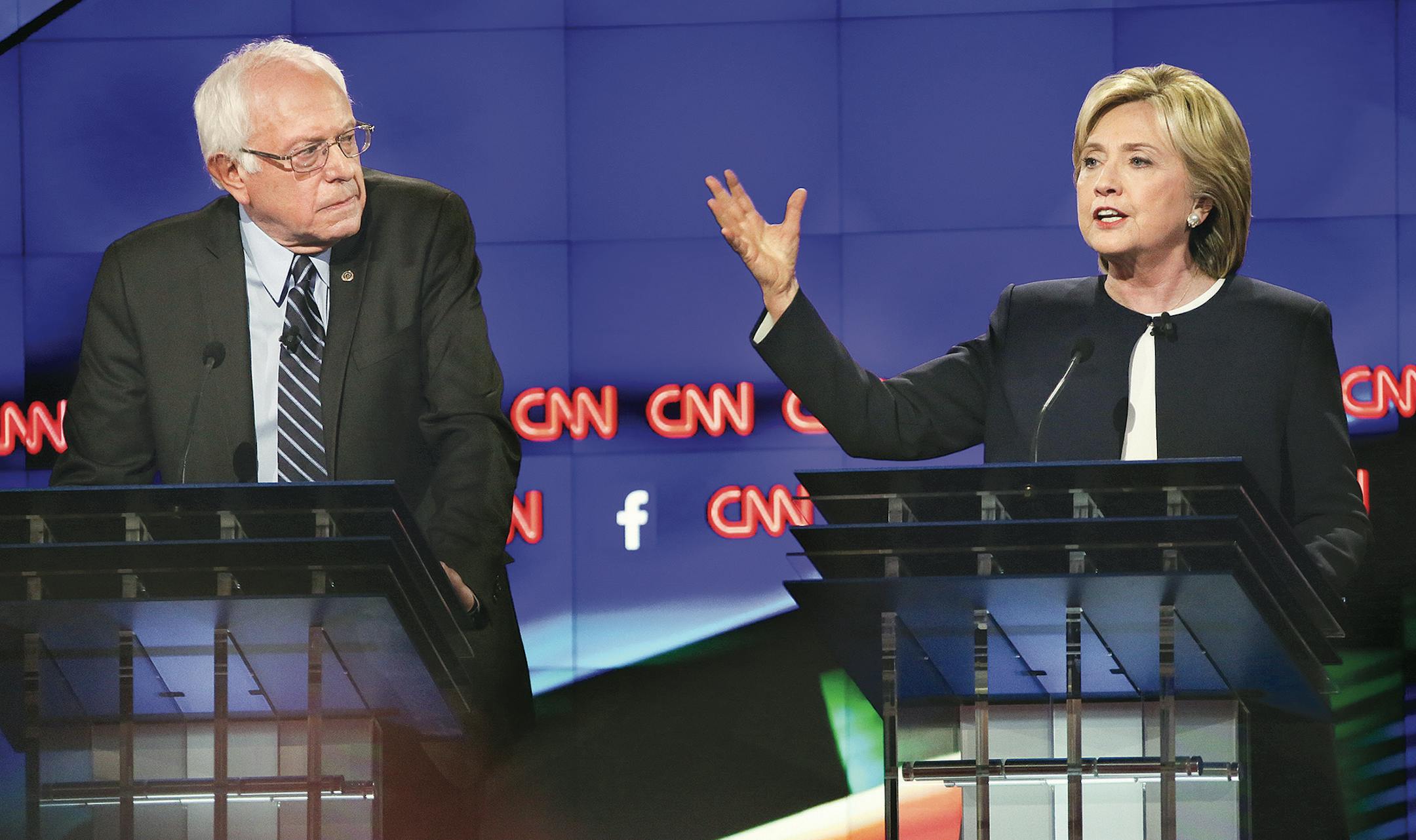 Democratic presidential hopefuls Bernie Sanders and Hillary Rodham Clinton during the Democratic presidential debate hosted by CNN in Las Vegas, Oct. 13, 2015. (Josh Haner/The New York Times) ORG XMIT: MIN2015101320262635 ORG XMIT: MIN1510132255130083