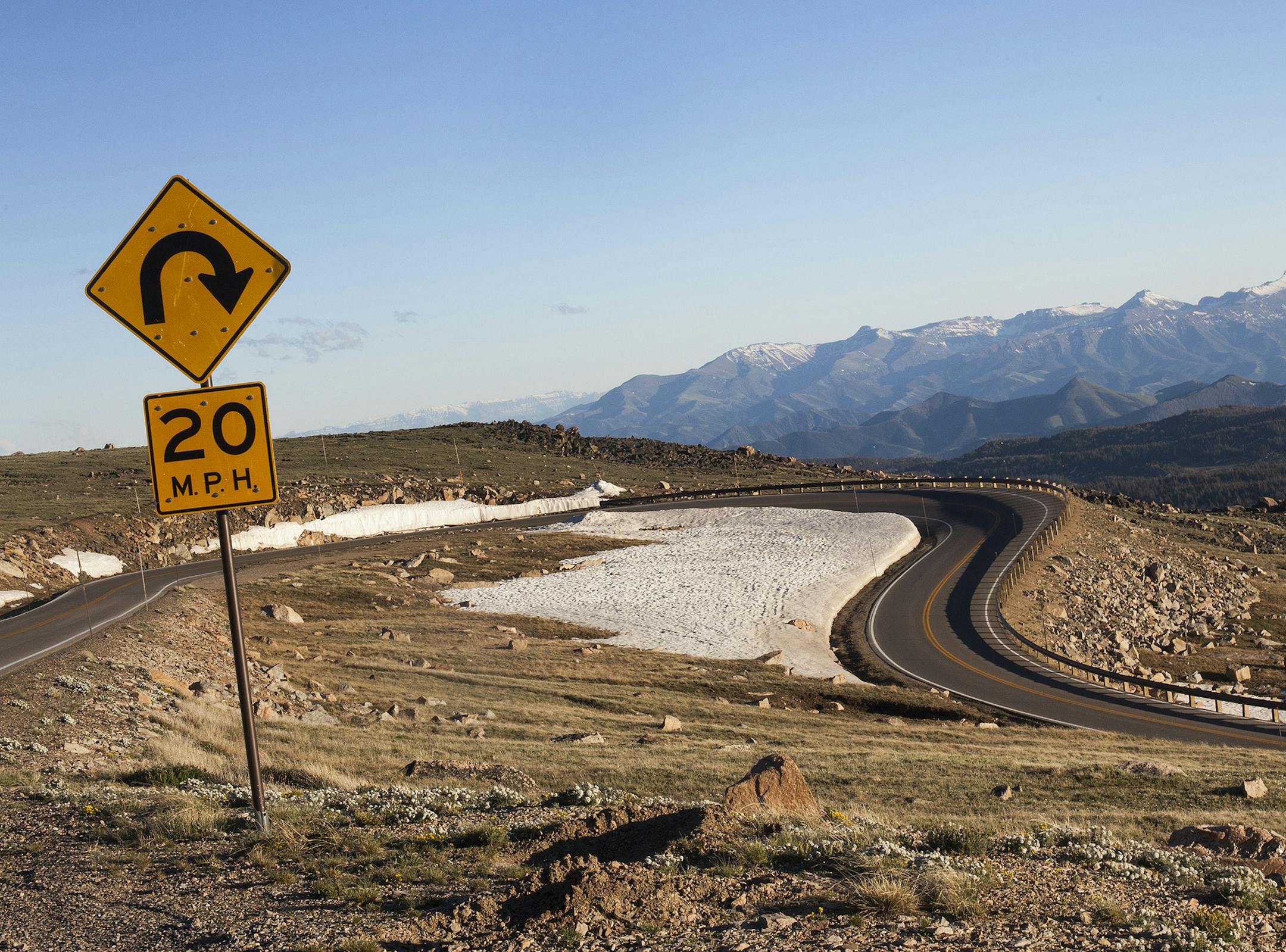-- PHOTO MOVED IN ADVANCE AND NOT FOR USE - ONLINE OR IN PRINT - BEFORE JULY 5, 2015. -- A segment of Bearttooth Pass near Red Lodge, Mont., June 13, 2015. Beartooth Pass is among the most breathtaking and perilous stretches of road in the country and it can be shut down even in summer because of ice, falling rocks, mudslides, fires and avalanches. (Janie Osborne/The New York Times) ORG XMIT: XNYT84