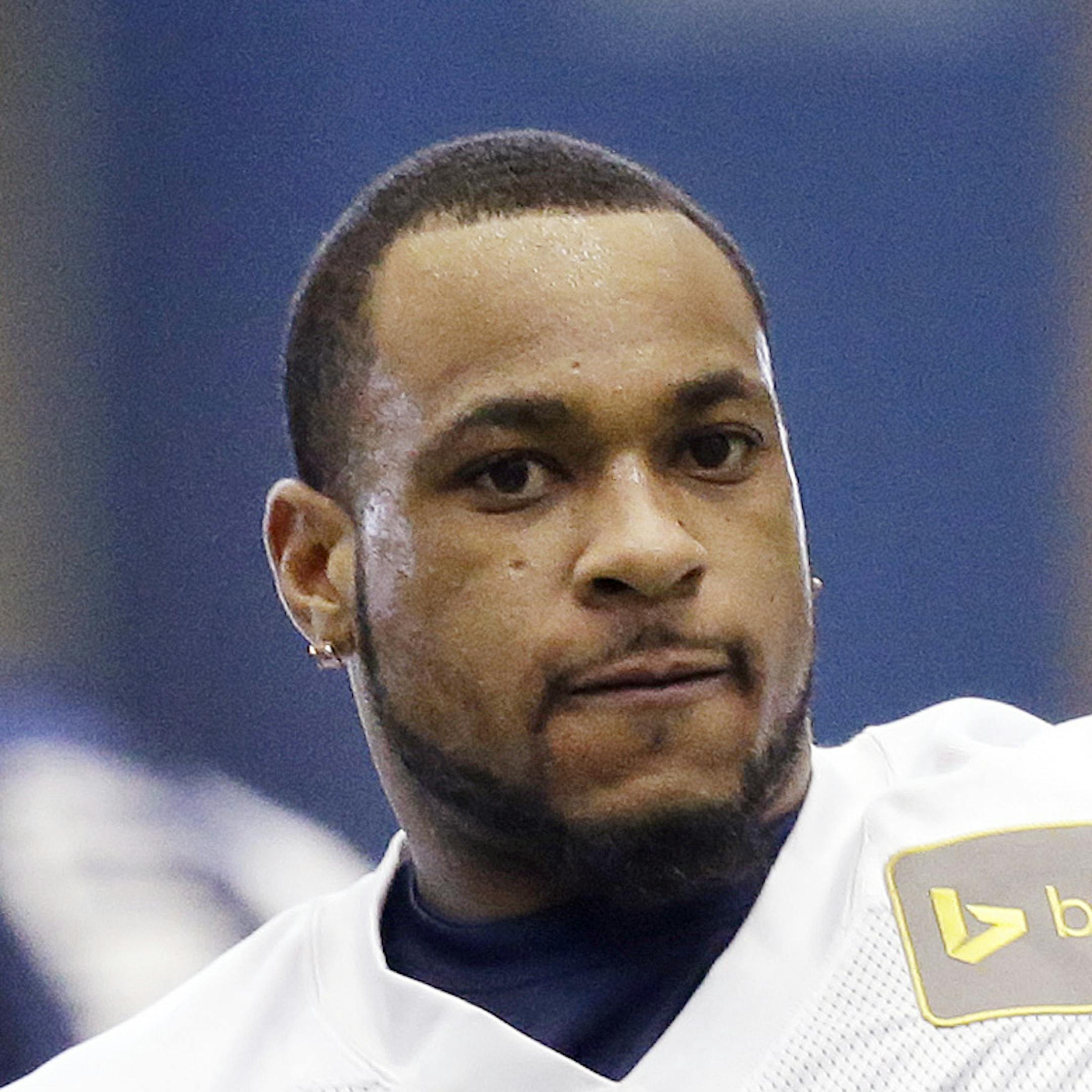 Seattle Seahawks wide receiver Percy Harvin stretches during NFL football practice Wednesday, Jan. 22, 2014, in Renton, Wash. The Seahawks play the Denver Broncos in the Super Bowl on Feb. 2. (AP Photo/Elaine Thompson)