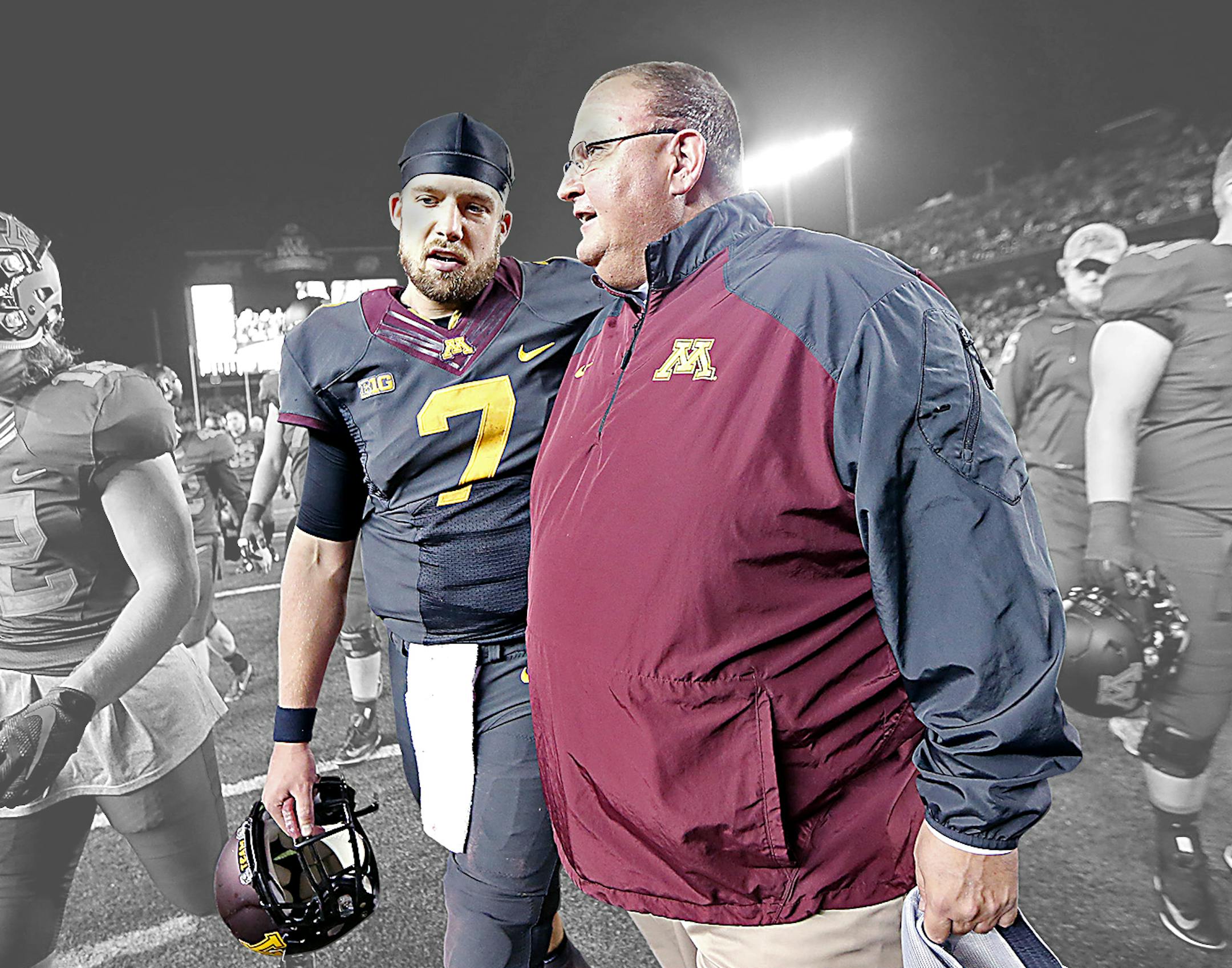 Interim Head Coach Tracy Claeys and Minnesota's quarterback Mitch Leidner walked off the field together after Michigan defeated Minnesota 29-26 at TCF Bank Stadium, Saturday, October 31, 2015 in Minneapolis, MN. ] (ELIZABETH FLORES/STAR TRIBUNE) ELIZABETH FLORES • eflores@startribune.com ORG XMIT: MIN1510312203170276