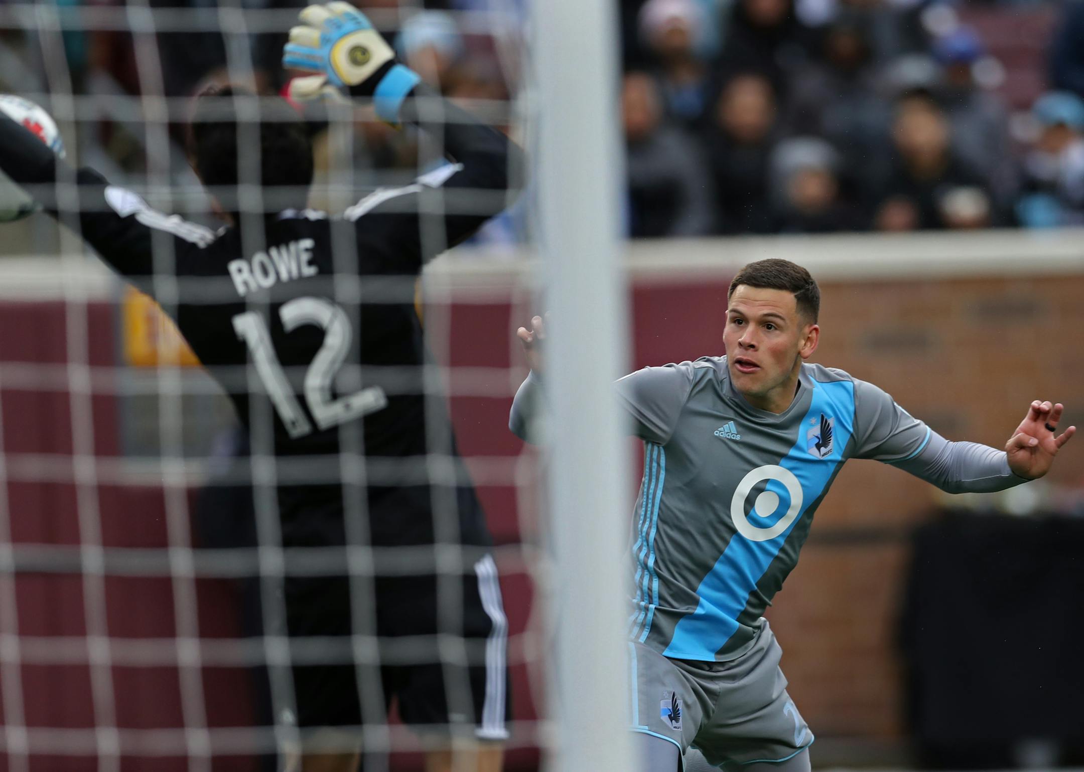 Goalie Brian Rowe(12) of the Galaxy blocks a shot by Christian Ramirez(21).] soccer game action, Loons host Los Angeles at TCF Stadium in Minneapolis.Richard Tsong-Taatariiïrichard.tsong-taatarii@startribune.com