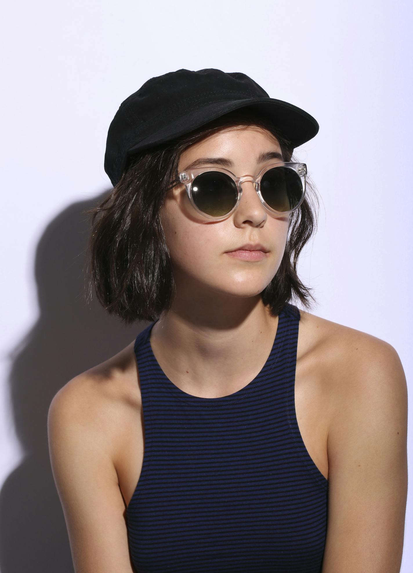 Komono Lulu sunglasses and Target ball cap.