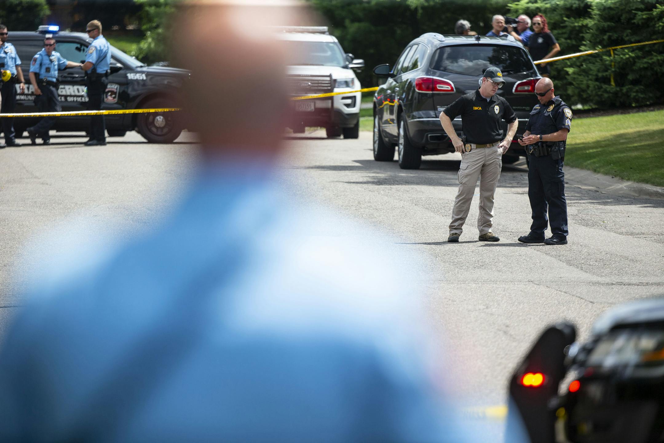 Police closed off the intersection of Highpoint Rd and Windsor Ln following an officer involved shooting. ALEX KORMANN ¥ alex.kormann@startribune.com An black man was shot by police on Sunday July 14, 2109 in the Woodbury neighborhood of St. Paul, Mn.