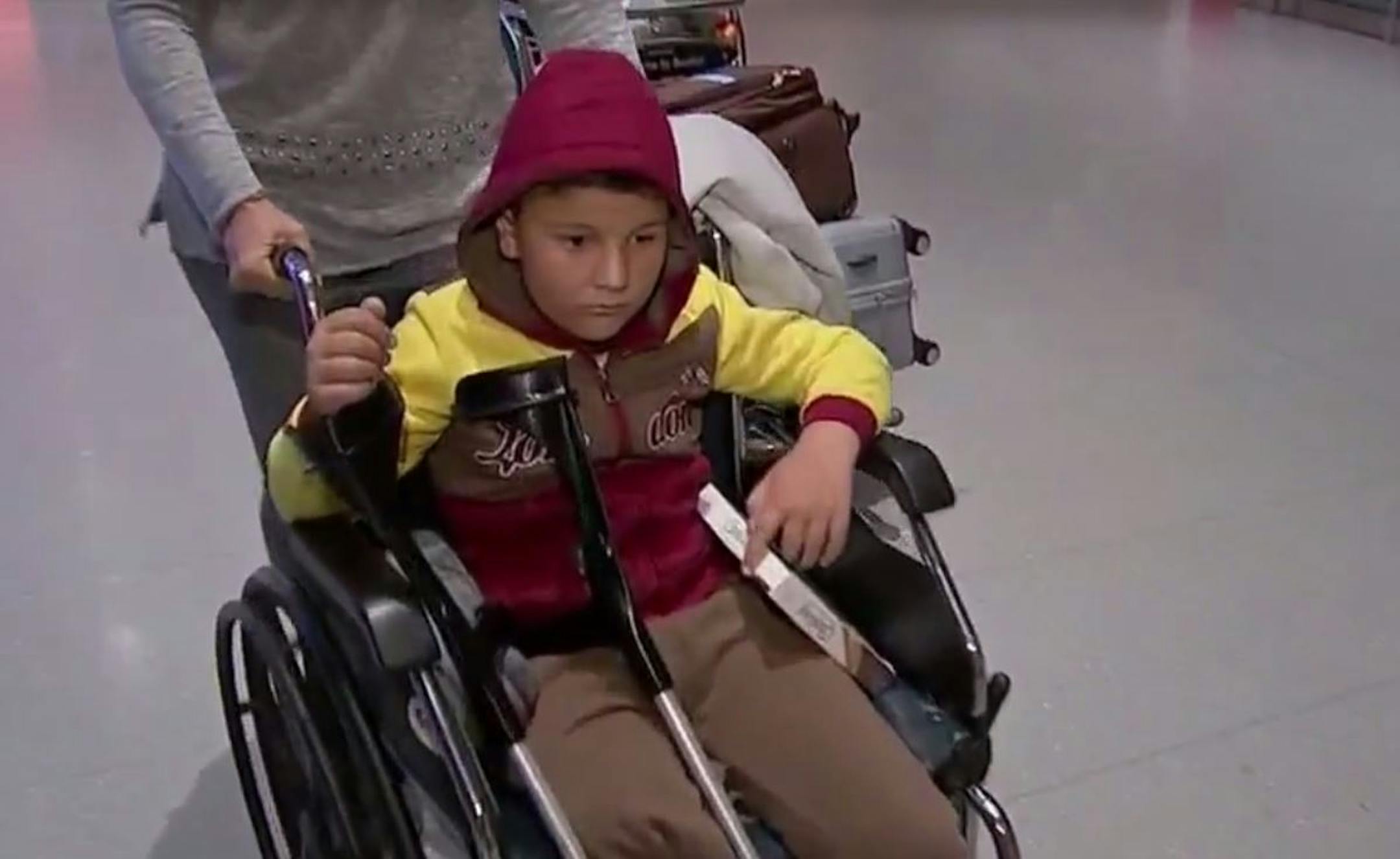 Two Yazidi children maimed in fighting in northern Iraq arrived Wednesday in Minneapolis for treatment at the Shriners Hospitals for Children.