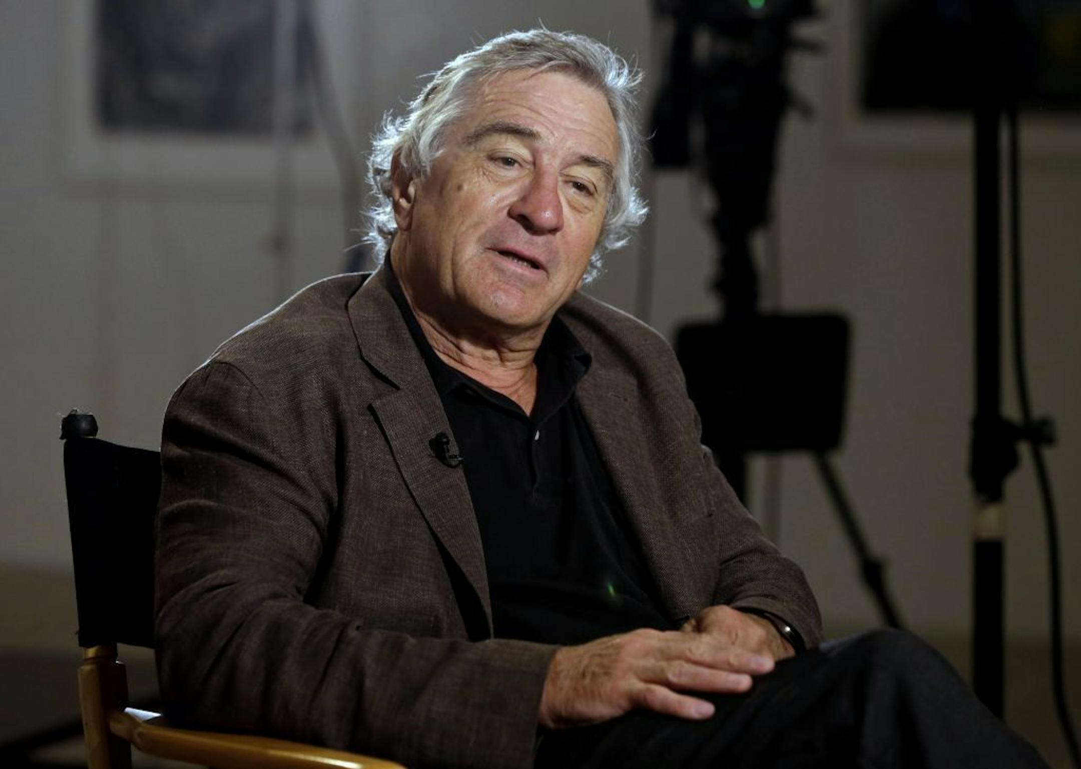 FILE - In this June 11, 2014 file photo, actor Robert De Niro is interviewed by Chris Wallace at the DC Moore Gallery, in New York. The prime minister of Antigua & Barbuda has appointed De Niro as special economic envoy of the twin-island nation in the eastern Caribbean.