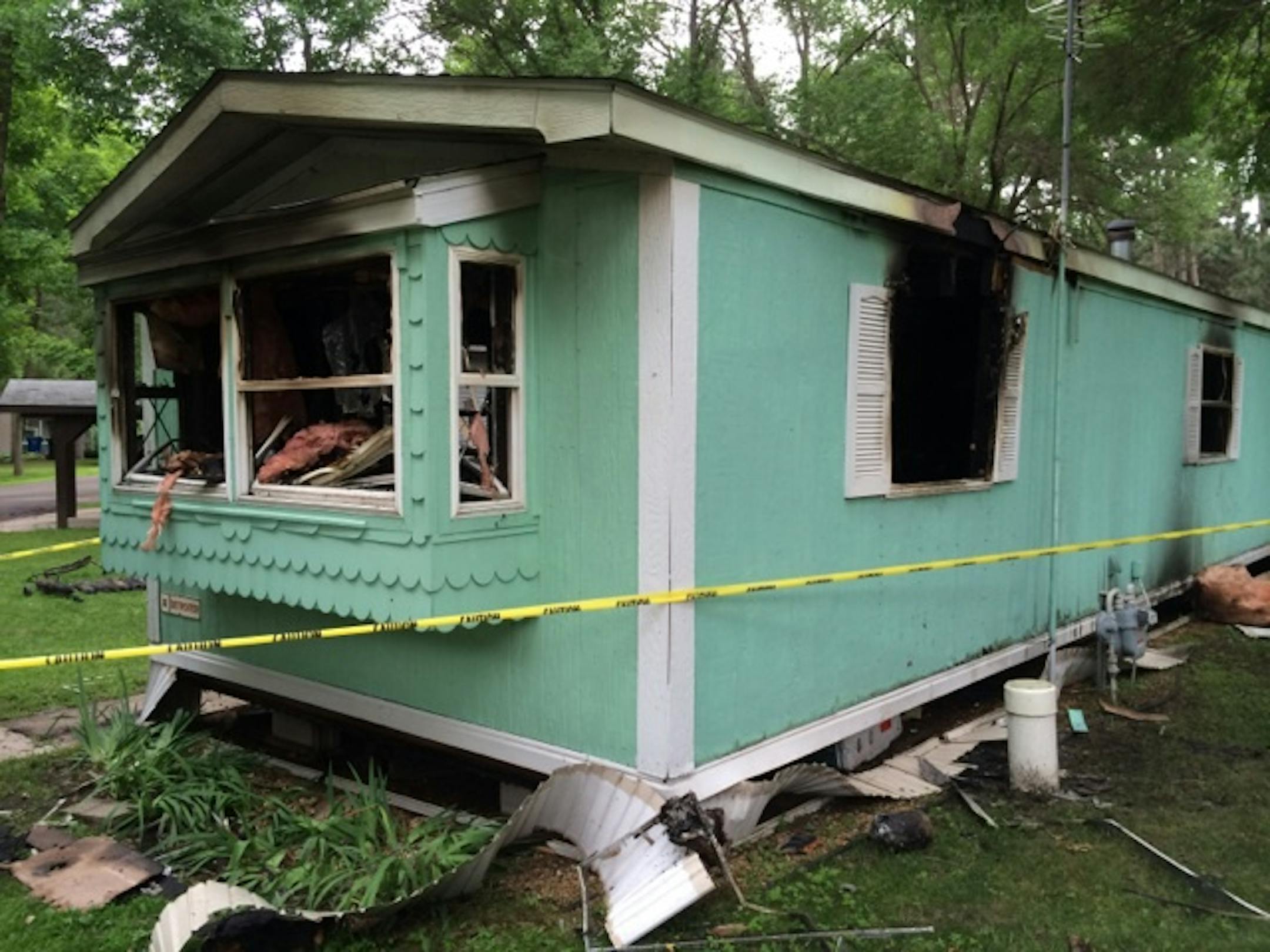 Resident Phillip Virkus was saved from his trailer home before fire destroyed it.