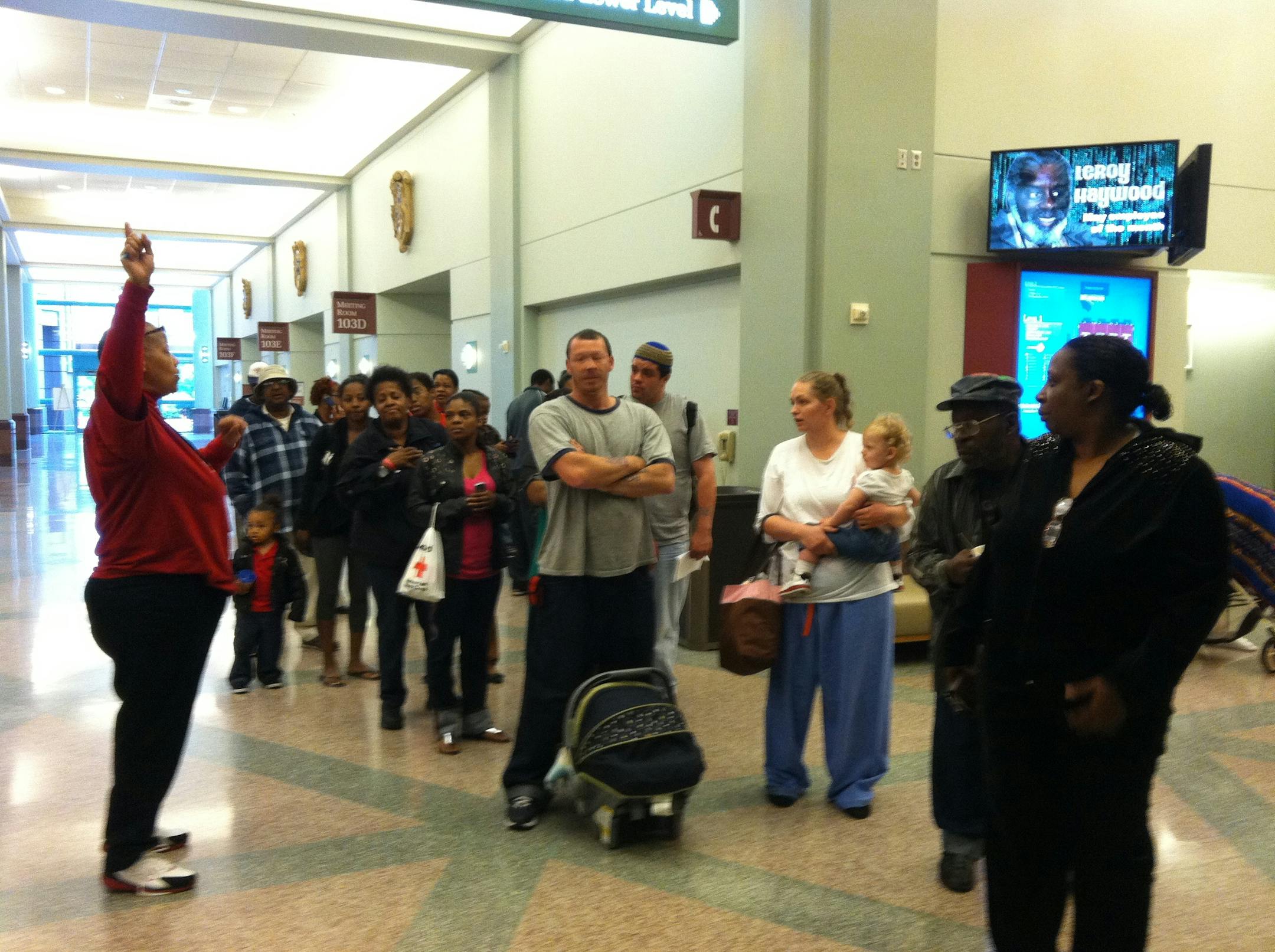 North Minneapolis residents gathered at the Minneapolis Convention Center ,where the city and Hennepin County are offering assistance services.