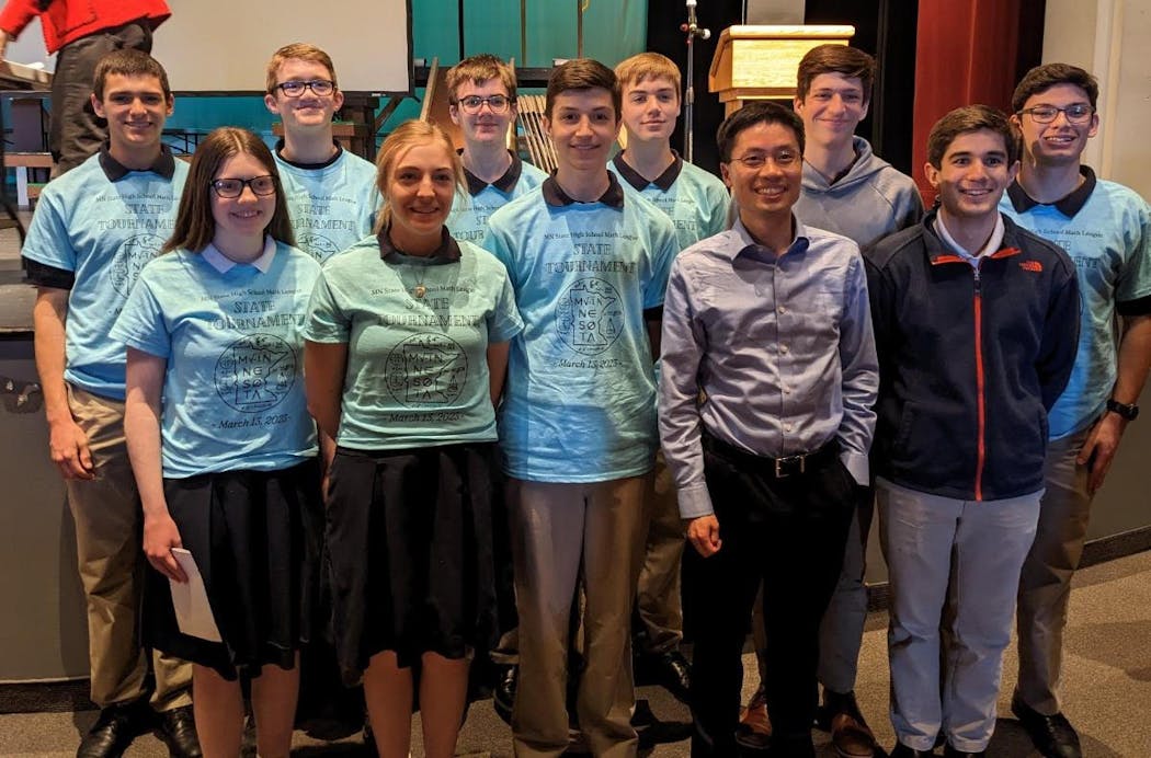 Po-Shen Loh with mathletes from St. Agnes School in St. Paul, one of about 50 teams statewide that qualified to compete in the Minnesota tournament, at which Loh was keynote speaker.