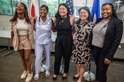 From left to right, Anika Bowie, Saura Jost, Mitra Jalali, Hwa Jeong Kim and Cheniqua Johnson posed after filing together in August to run for the St.