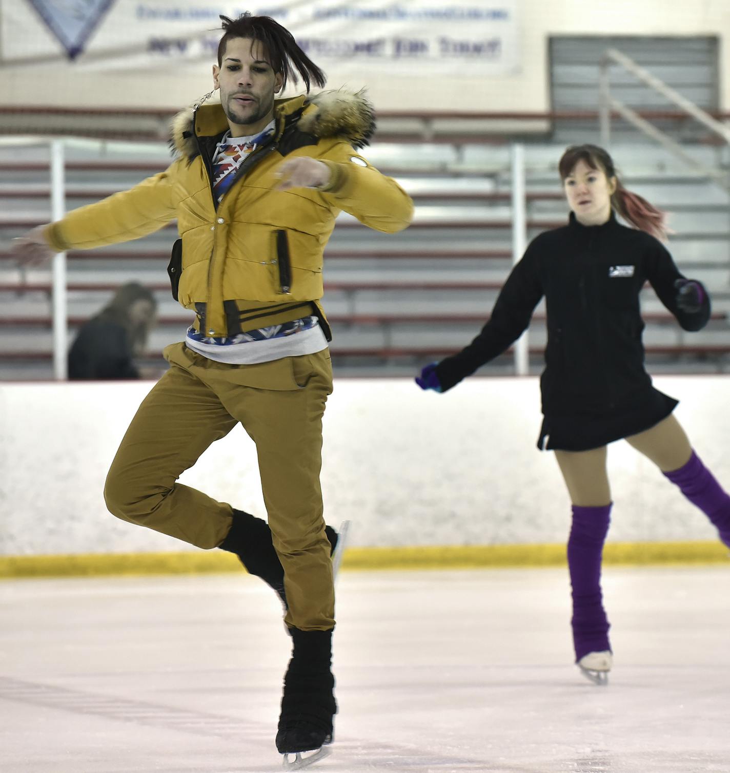 Monument, CO. January 17: 7K International Skating Academy artistic director Rohene Ward, left, works with student Sonja Hilmer during a practice session in Monument, Colorado, January 17, 2016. Ward will be performing during the opening ceremonies at the 2016 US Figure Skating Championships this week, as well as accompanying a number of his students to compete in the event. (Brenden Neville. Special to the Star Tribune)