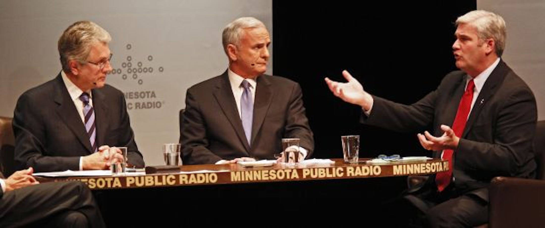 Republican gubernatorial candidate Tom Emmer, right, made a point as Independent Party candidate Tom Horner, left, and DFL candidate Mark Dayton listened. The debate, hosted by MPR in St. Paul, was the last of the campaign.