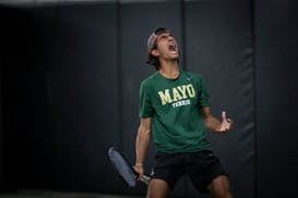 Rochester Mayo’s Tej Bhagra reacts to winning the first set on the way to the Class 2A singles championship.