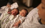 Twin girls who were born prematurely in 2013 at the Mother Baby Center at Children's Hospital in Minneapolis. Minnesota's 2013 preterm births were det