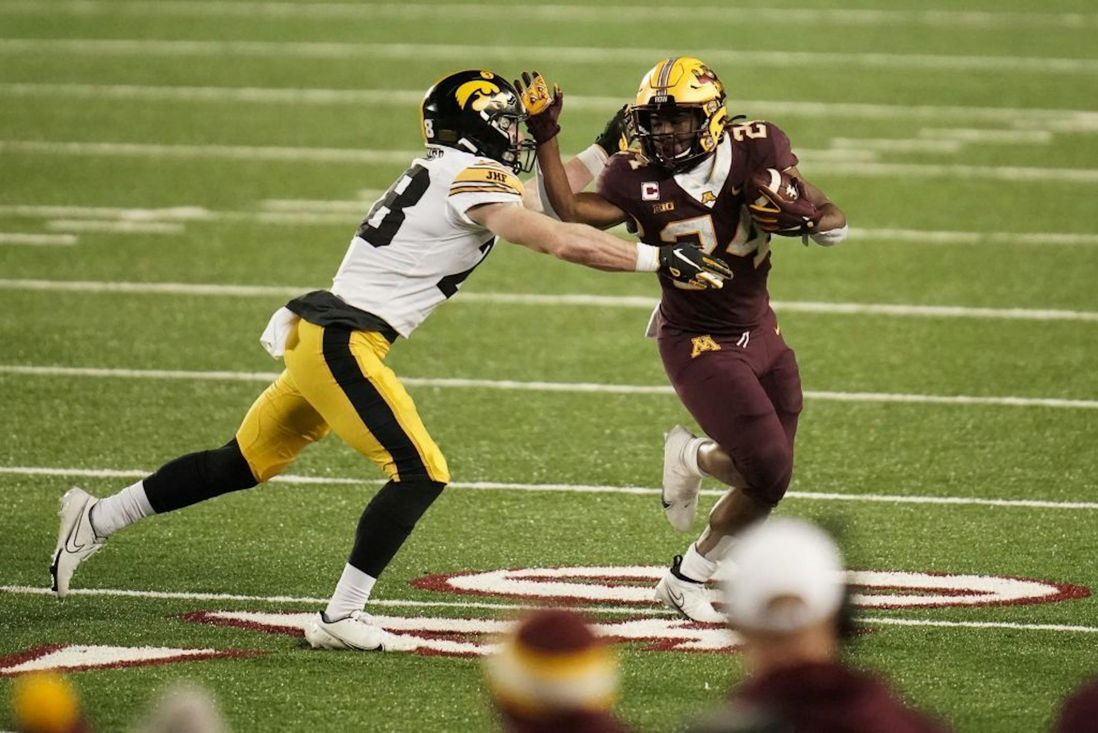 Minnesota Gophers running back Mohamed Ibrahim (24) made a first down in the third quarter.