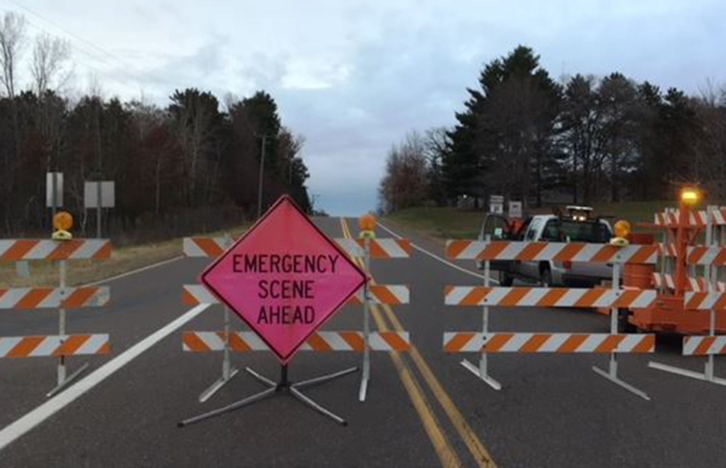 County Road P in Chippewa County, Wis., was blocked off late Saturday, near where two young girls and one adult were fatally injured and two other children suffered serious injuries in a hit-and-run crash.