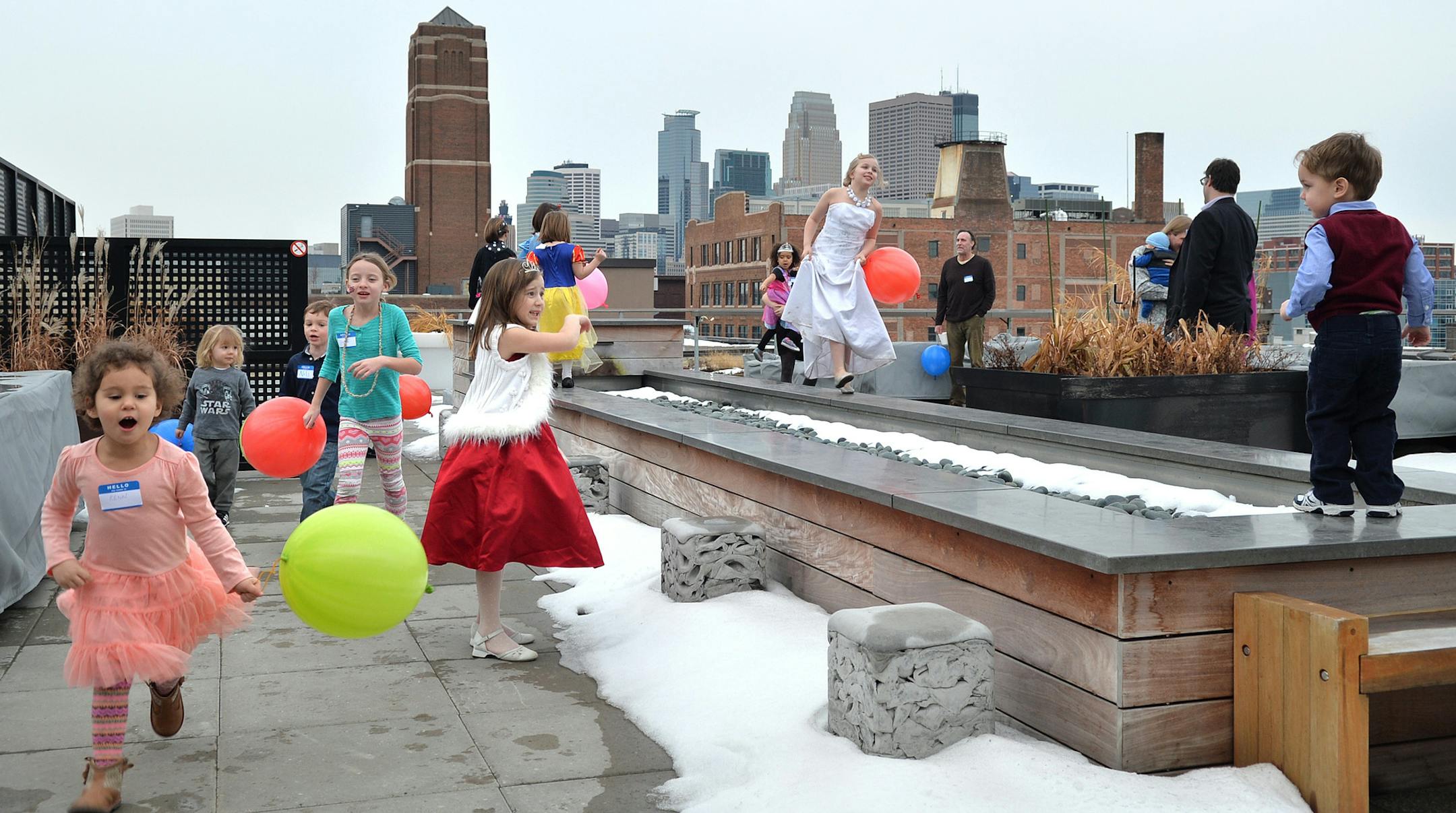 Party guests mingle and network at the Fancy Pants Winter Dance party outside the rooftop party room at the North Loop's ElseWarehouse apartments. ] (SPECIAL TO THE STAR TRIBUNE/BRE McGEE)