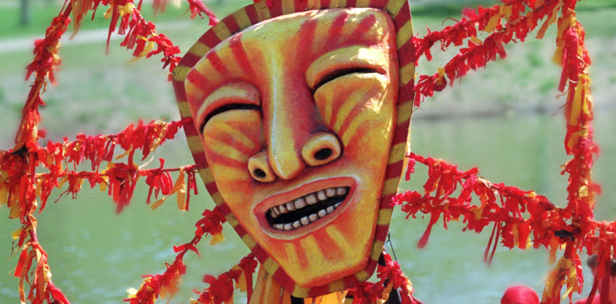 Volunteers hoist the massive sun puppet symbolizing the return of the spring during the annual May Day celebration in Powderhorn Park. This is the 25th anniversary of the In the Heart of the Beast Theatre which puts on the May Day Parade through the Phillips Neighborhood. ORG XMIT: MIN2013042613291979