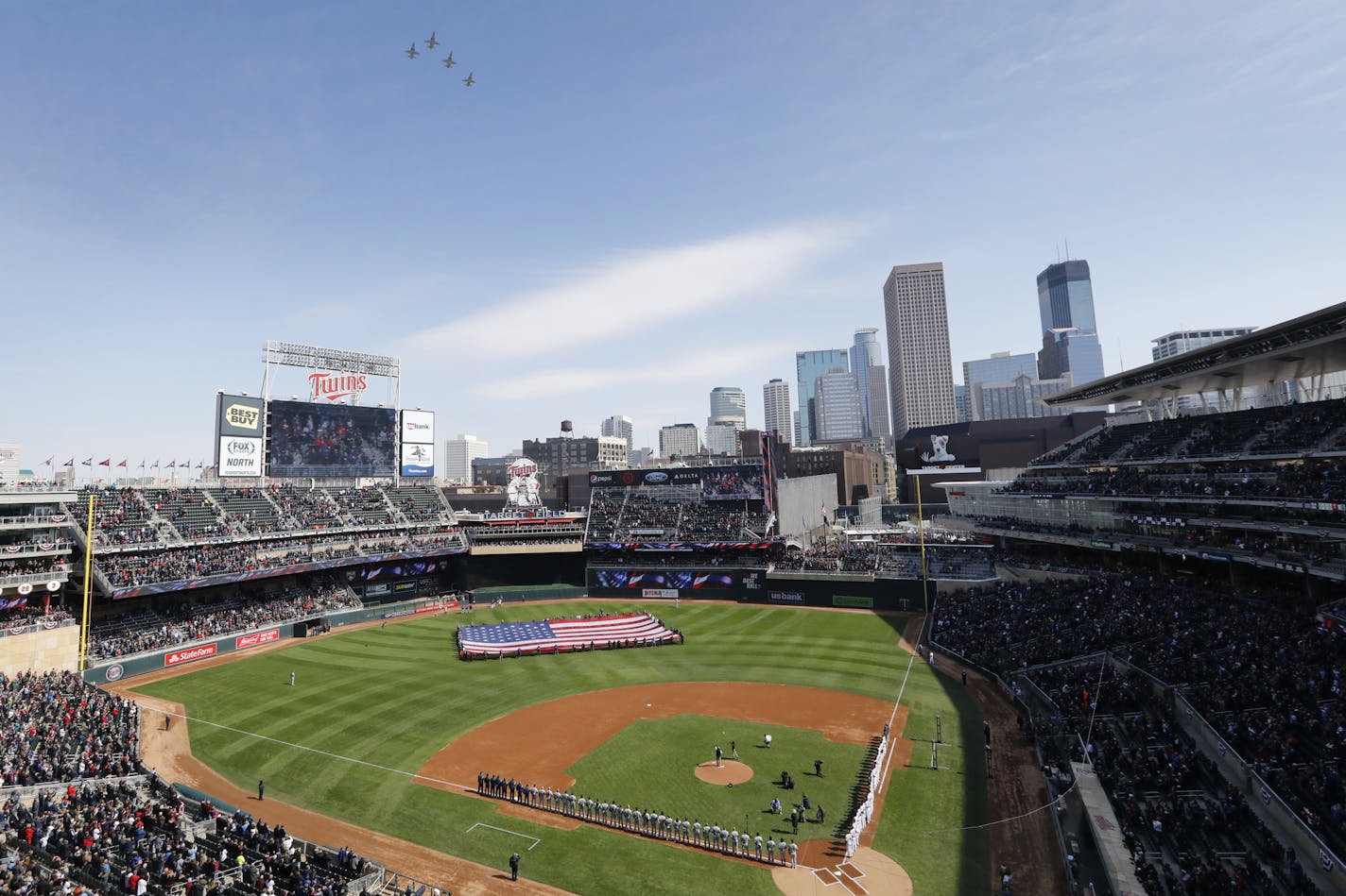 Four T-38s from the United States Air Force flyover Target Field during the National Anthem before the game. ] LEILA NAVIDI &#xef; leila.navidi@startribune.com BACKGROUND INFORMATION: The Minnesota Twins home opener against the Seattle Mariners at Target Field in Minneapolis on Thursday, April 5, 2018.