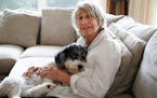 Mary Oliver, a best-selling poet, with Ricky, a Havanese who plays a part in her latest collection, "Dog Songs," at her home in Hobe Sound, Fla., Sept
