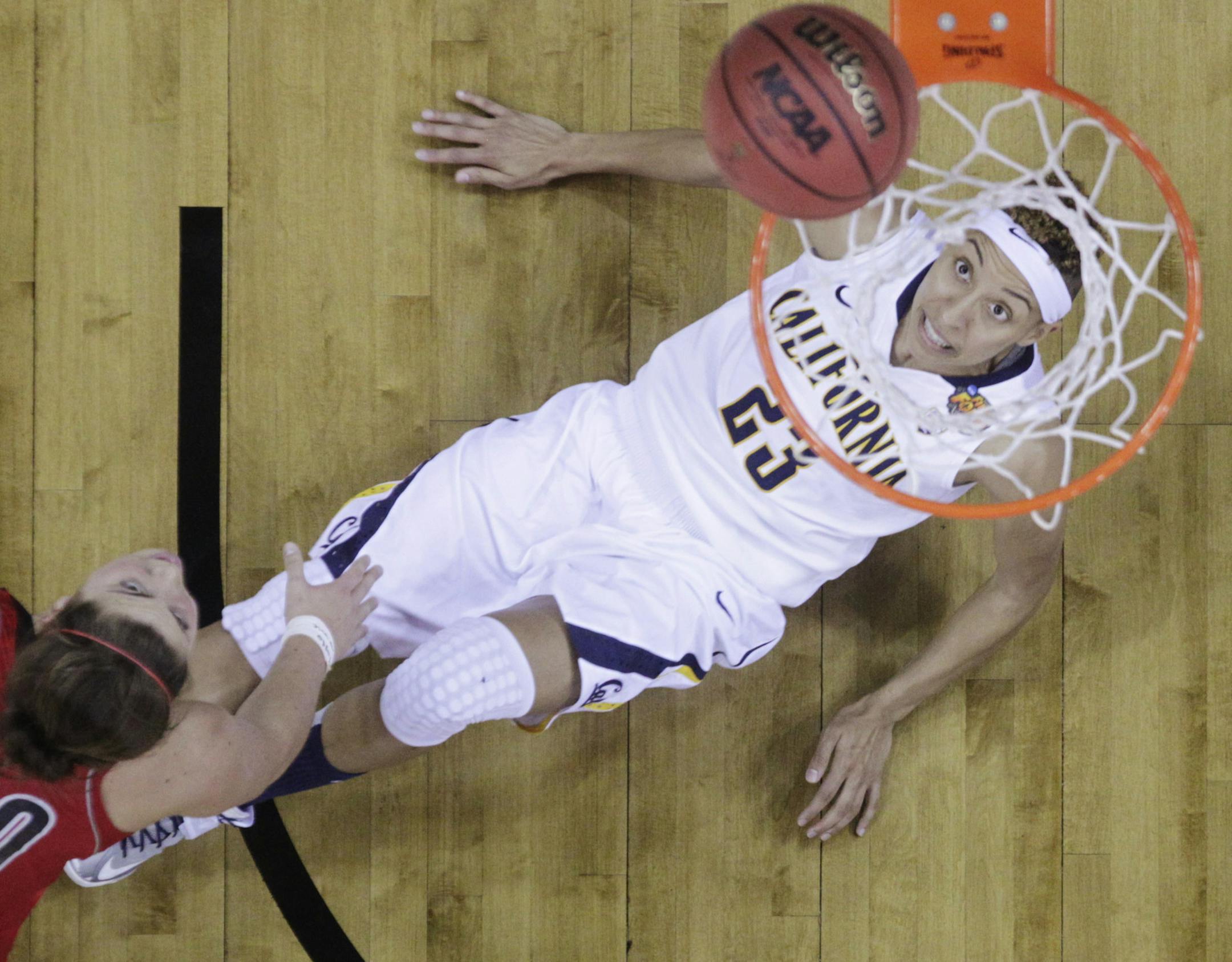 California guard Layshia Clarendon (23) looks at the ball as Louisville forward Sara Hammond (00) shoots in the second half of a national semifinal at the Women's Final Four of the NCAA college basketball tournament, Sunday, April 7, 2013, in New Orleans. (AP Photo/Dave Martin)