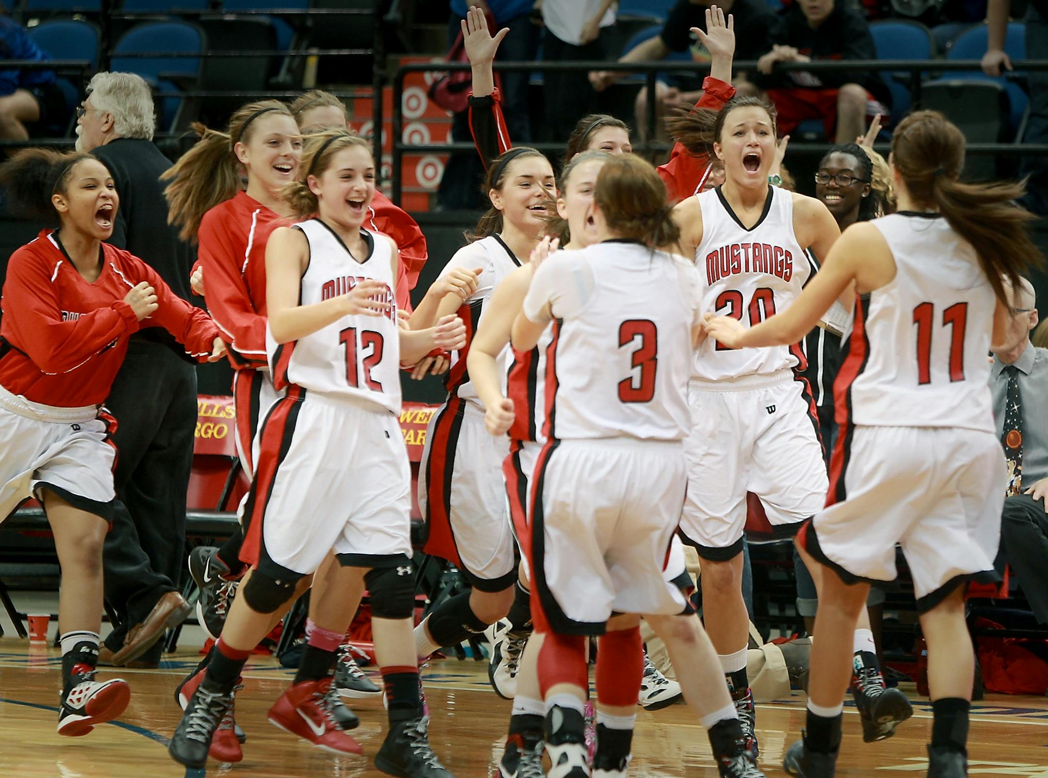 Maranatha Christian Academy's team cleared the bench as they won the Class 1A girls' basketball semifinals at the Target Center, Friday, March 16, 2012 . Maranatha Christian Academy defeated Spring Grove in a controversial 65-61 win. ELIZABETH FLORES/STAR TRIBUNE) ELIZABETH FLORES � eflores@startribune.com