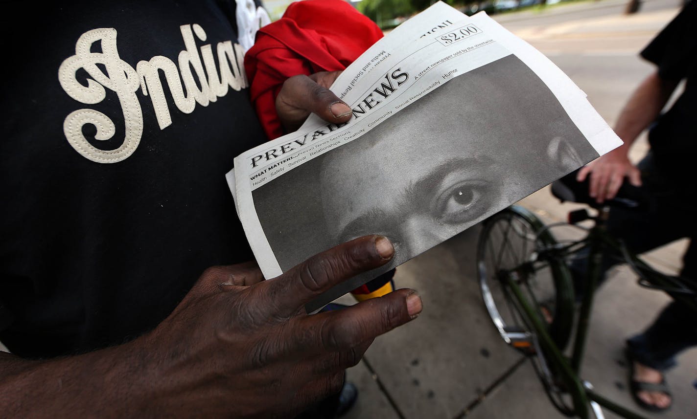 Dwain Willkerson held one of Sedgewick&#xed;s newspapers as the two talked outside the Dorothy Day Center in St. Paul.] JIM GEHRZ &#xef; james.gehrz@startribune.com / St. Paul, MN / June 118, 2015 / 9:00 AM &#xf1; BACKGROUND INFORMATION: Jerry Sedgewick sees them too, the people standing at the side of the freeway off ramps, holding signs asking for money. Sedgewick, 59 and a scientist by training, wanted to do something more meaningful that hand them a couple bucks out his car window. Then, on