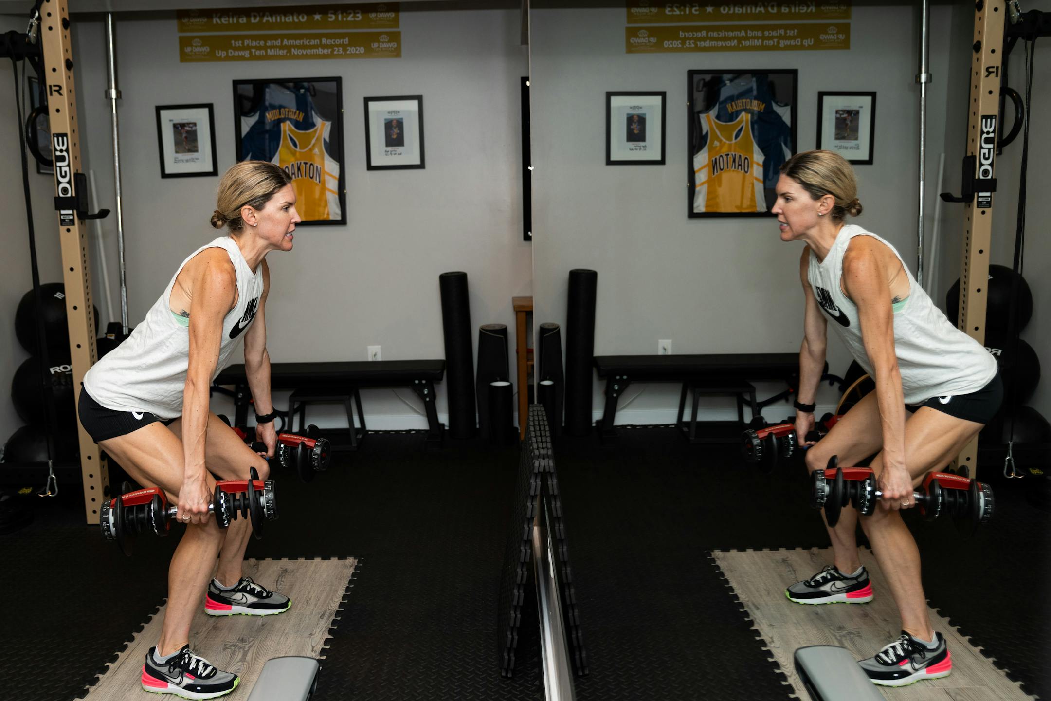 Keira D'Amato works out in her home gym after training on June 30, 2022. (MUST CREDIT: Photo for The Washington Post by ).