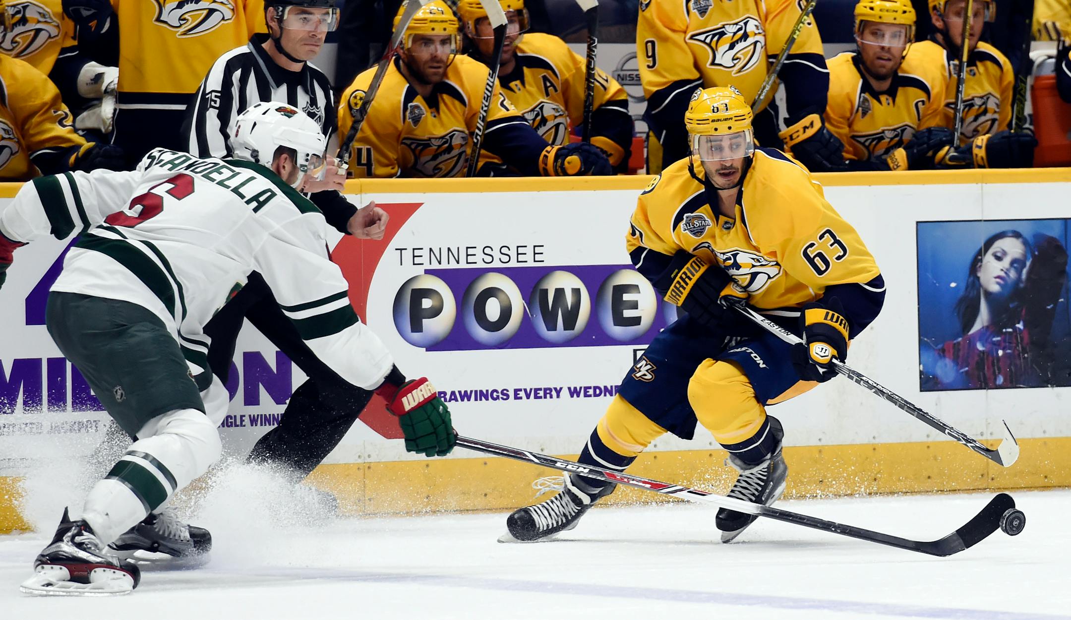 Nashville Predators center Mike Ribeiro (63) maneuvers the puck past Minnesota Wild defenseman Marco Scandella (6) during the second period of an NHL hockey game Saturday, Jan. 16, 2016, in Nashville, Tenn. (AP Photo/Mark Zaleski)