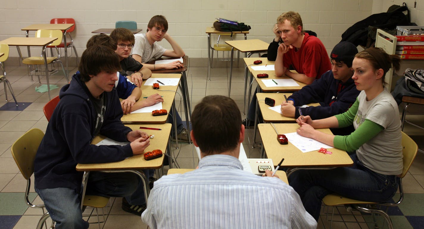 Teams listened carefully to the question posed by teacher Matt Quinn from the list of quiz bowl questions during practice at Armstrong High School. Next year the quiz bowl program will be cut after this years team goes to Nationals.