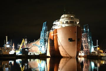 The William A. Irvin museum ore ship was carefully moved into its slip at the Duluth Harbor late Wednesday.