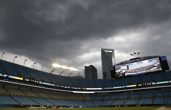 Storm clouds gather over Bank of America Stadium before a preseason NFL football game between the Carolina Panthers and the Pittsburgh Steelers in Cha