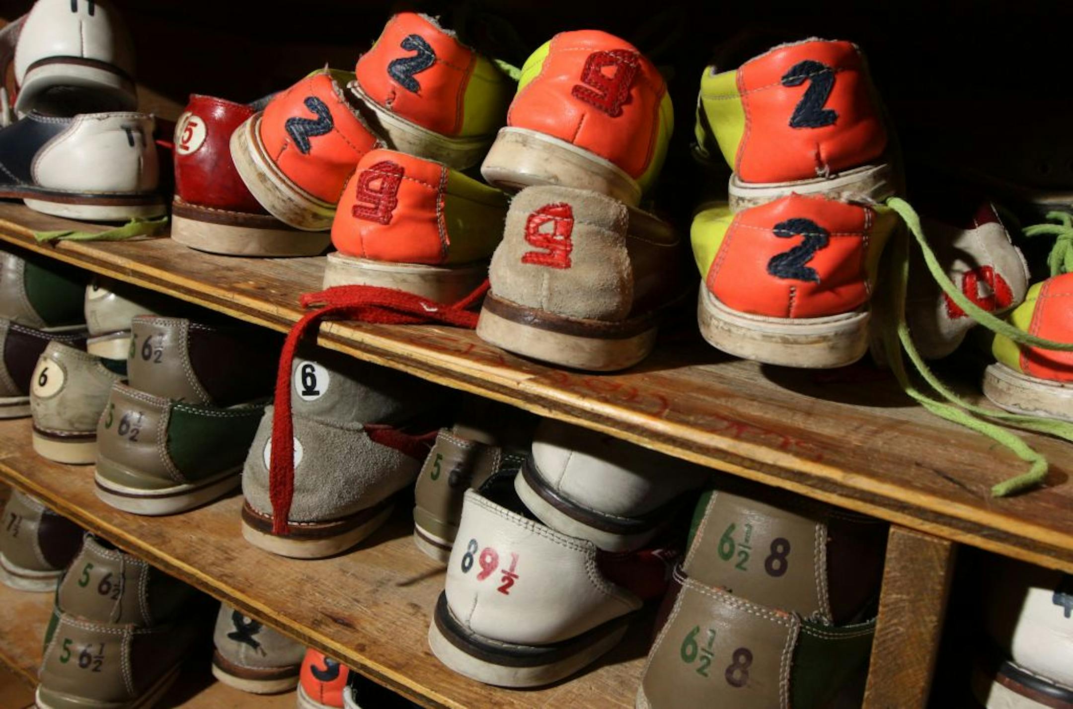 Shoes lined the shelves at Mady's Bowl and Lounge in Columbia Heights. Nearly everything will be sold during a liquidation sale.