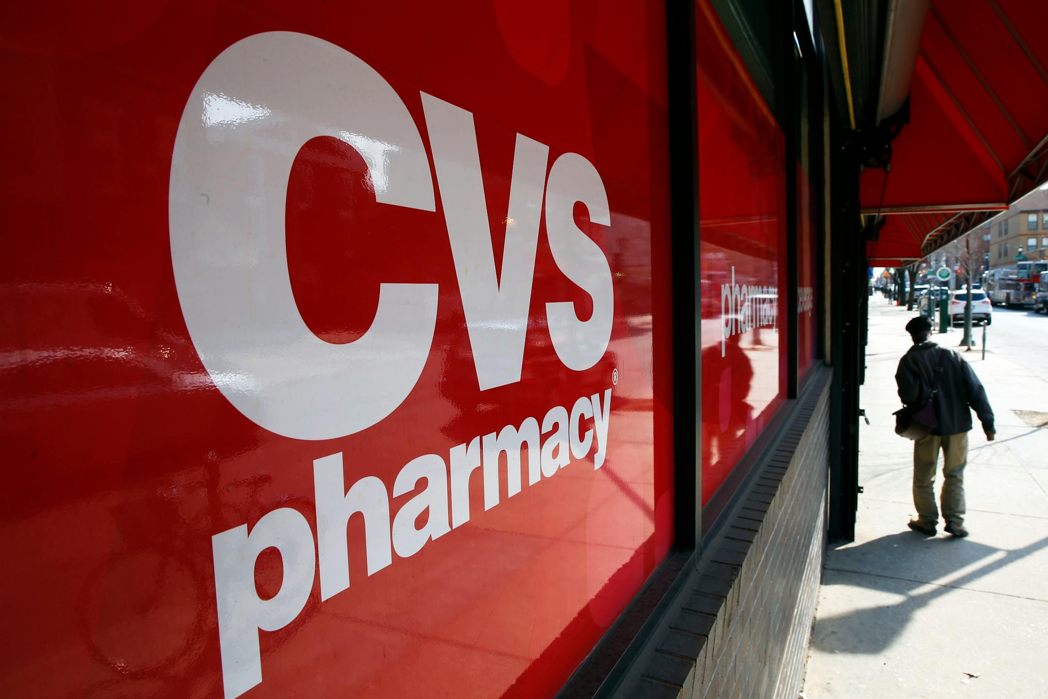 FILE - This March 25, 2014, file photo, shows a CVS store in Philadelphia. CVS Health will buy Omnicare in a deal valued at about $12.7 billion in move to expand its pharmacy services reach into assisted living and senior care facilities. (AP Photo/Matt Rourke, File)