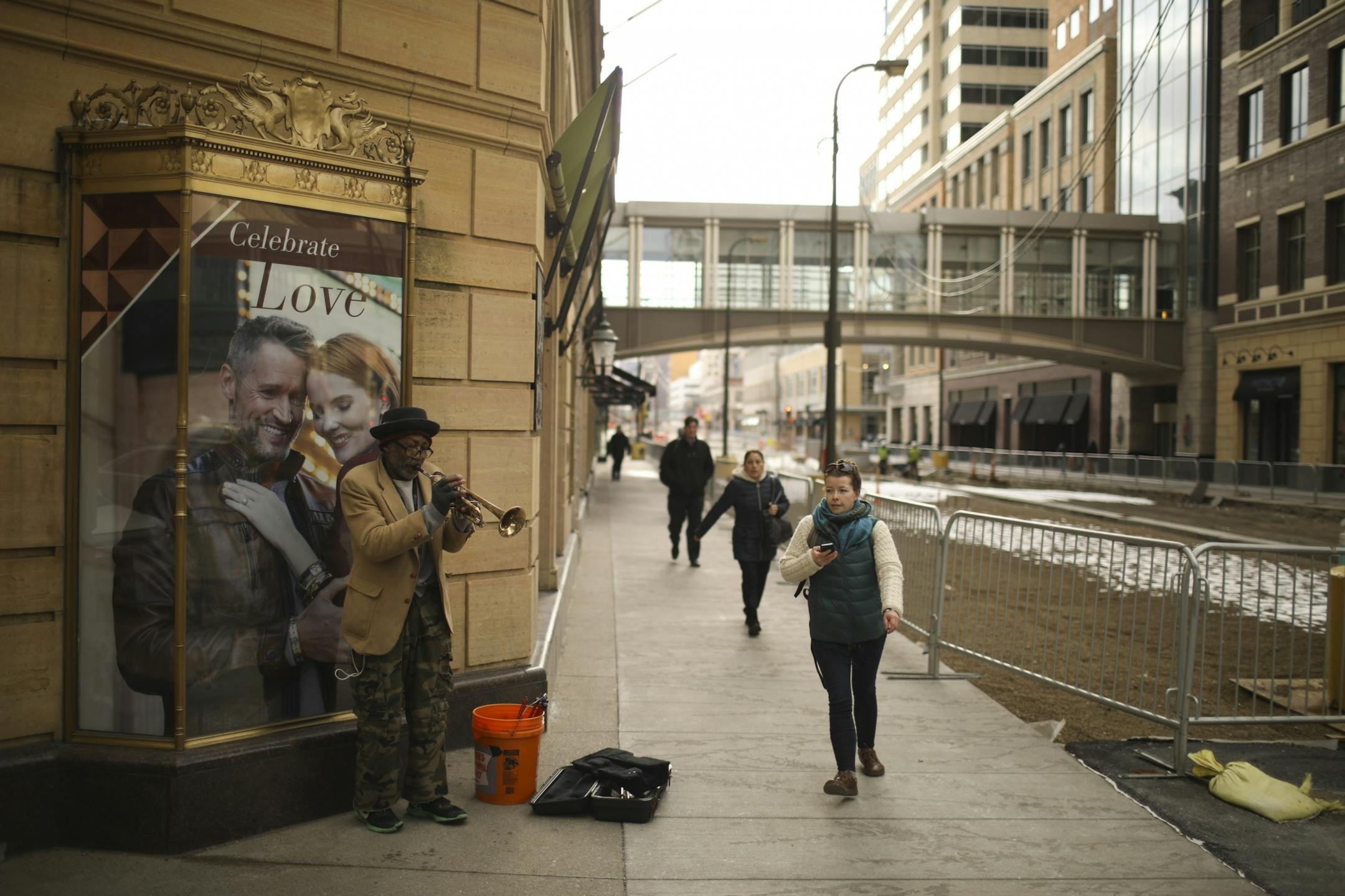 Joceephus Lomax busked with his trumpet on the corner of S. 9th St. and the Nicollet Mall Wednesday afternoon.