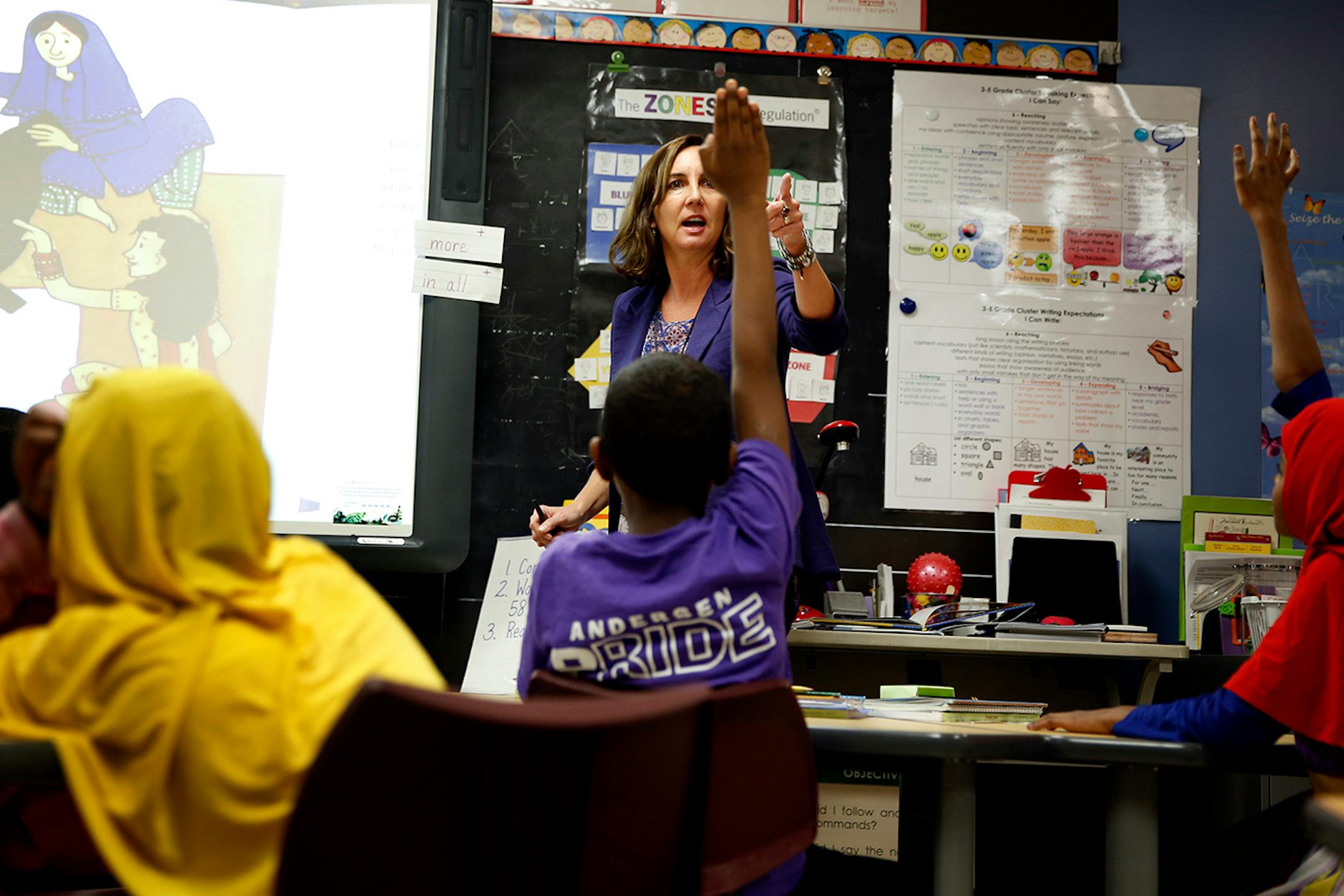 Stephany Jallo teaches 3rd through 5th grade Somali immigrant students in her classroom at Andersen United Community School in Minneapolis. ] LEILA NAVIDI leila.navidi@startribune.com / BACKGROUND INFORMATION: Tuesday, October 21, 2014. The Minneapolis school district launched a new program last school year with sheltered classrooms and instruction in both Somali and English for new refugee arrivals, many of whom come with little formal education.