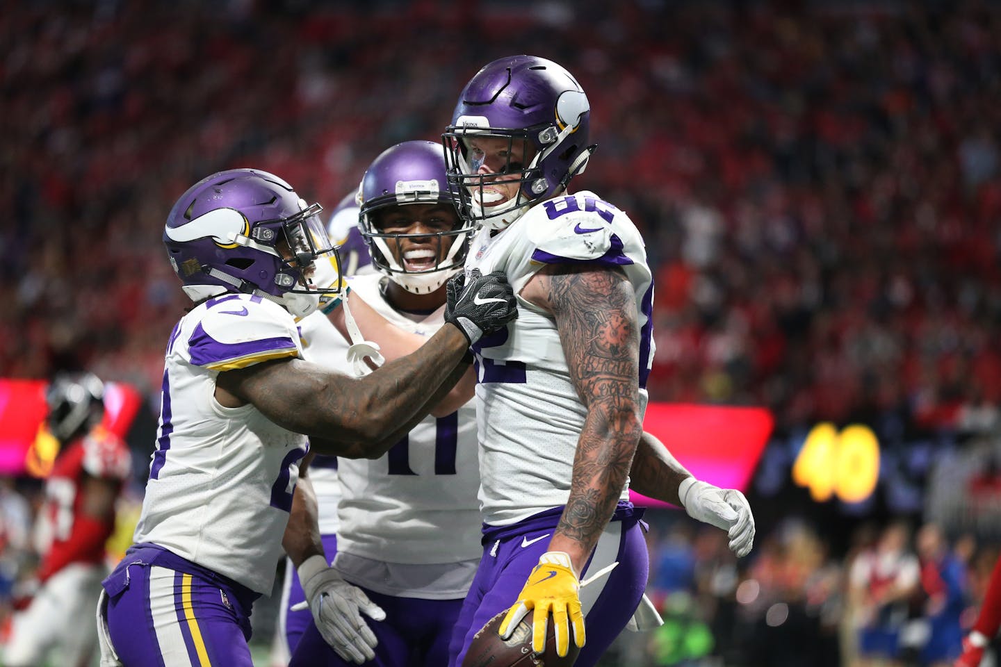 Vikings running back Jerick McKinnon, and receiver Laquon Treadwell celebrated Kyle Rudolph's 6-yard touchdown against the Falcons.