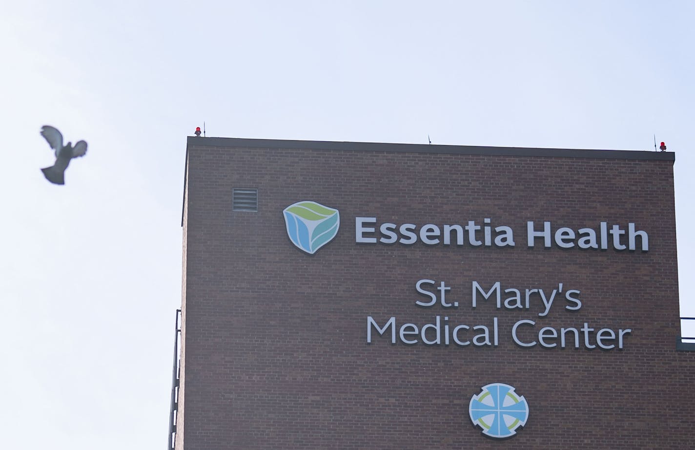 Duluth-based Essentia Health is putting more employees on leave and reducing hours and pay for physicians and executives.