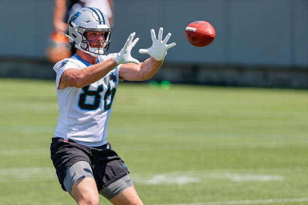 Carolina Panthers tight end Colin Thompson catches a pass during NFL football practice in Charlotte, N.C., Wednesday, June 1, 2022. (AP Photo/Nell Red