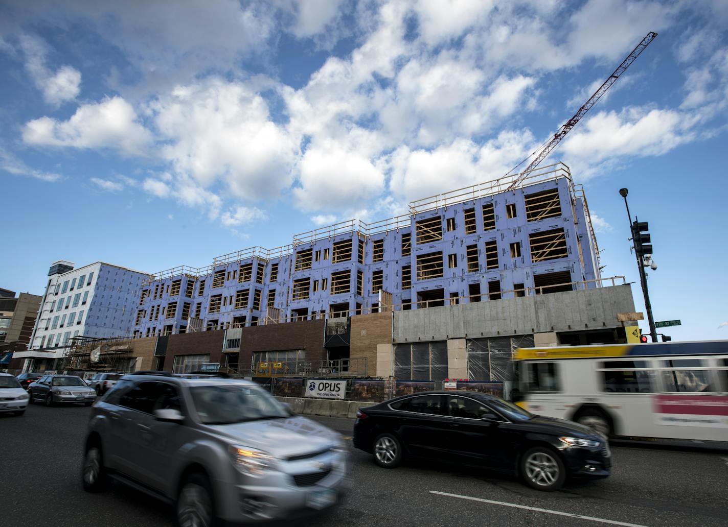 Apartments are rising where the now-razed Seven Corners Hardware stood.