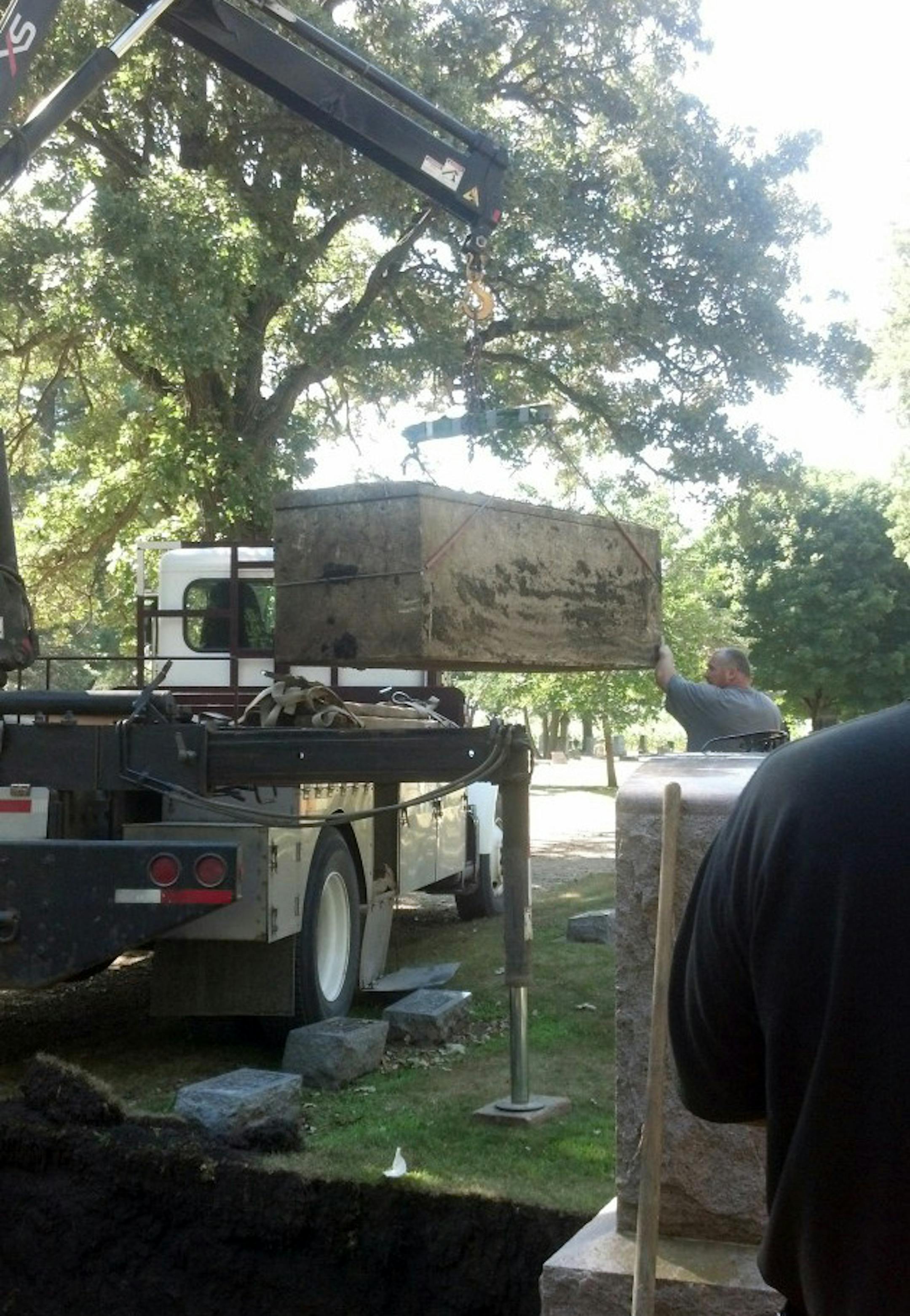 Caption: The body of a woman who was killed in 1980 and her body left in a southern Minnesota ditch. The exhumation occurred in August at Riverside Cemetery in Blue Earth, Minn.