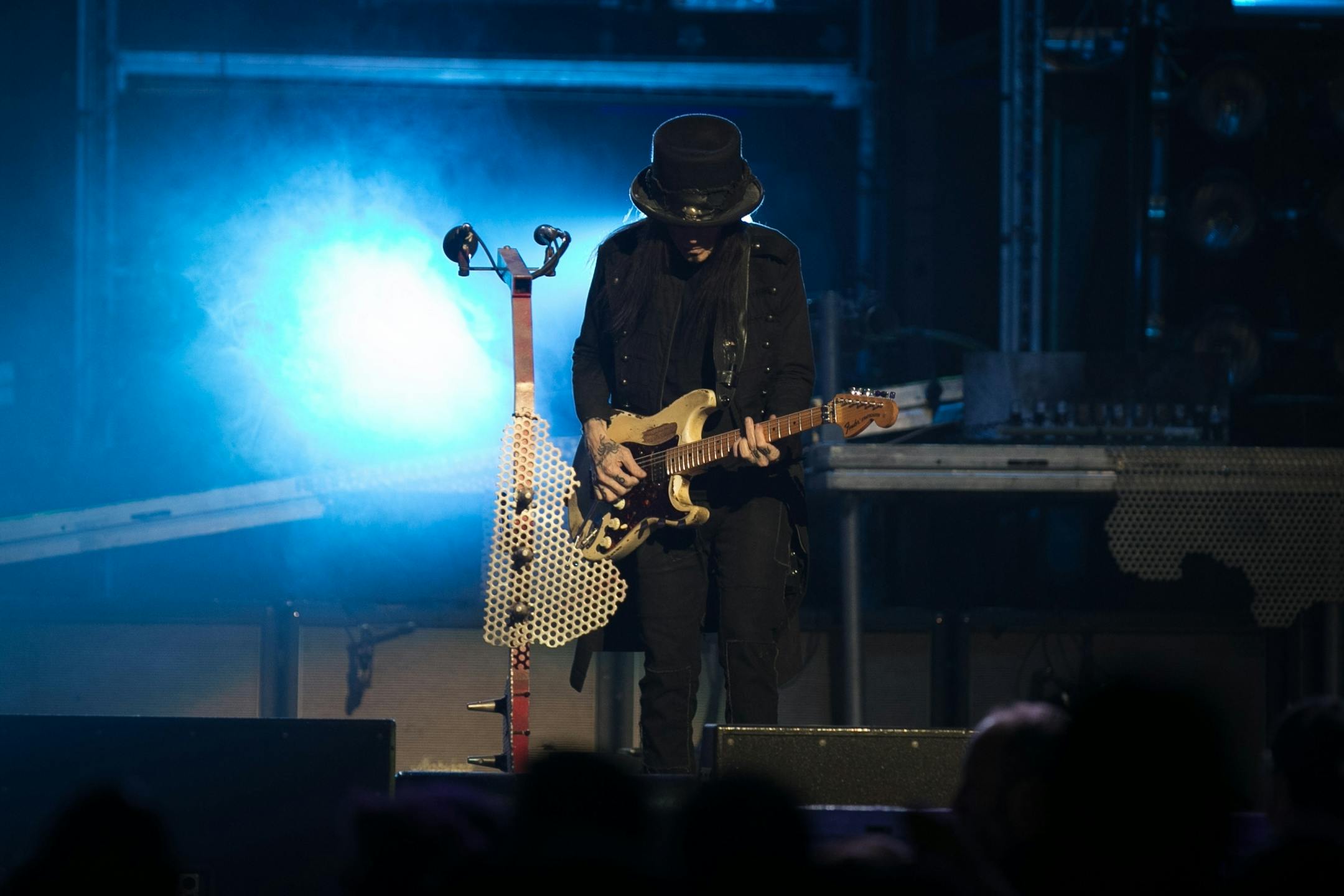 Motley Crue guitarist Mick Mars performs Saturday night at Xcel Energy Center.
