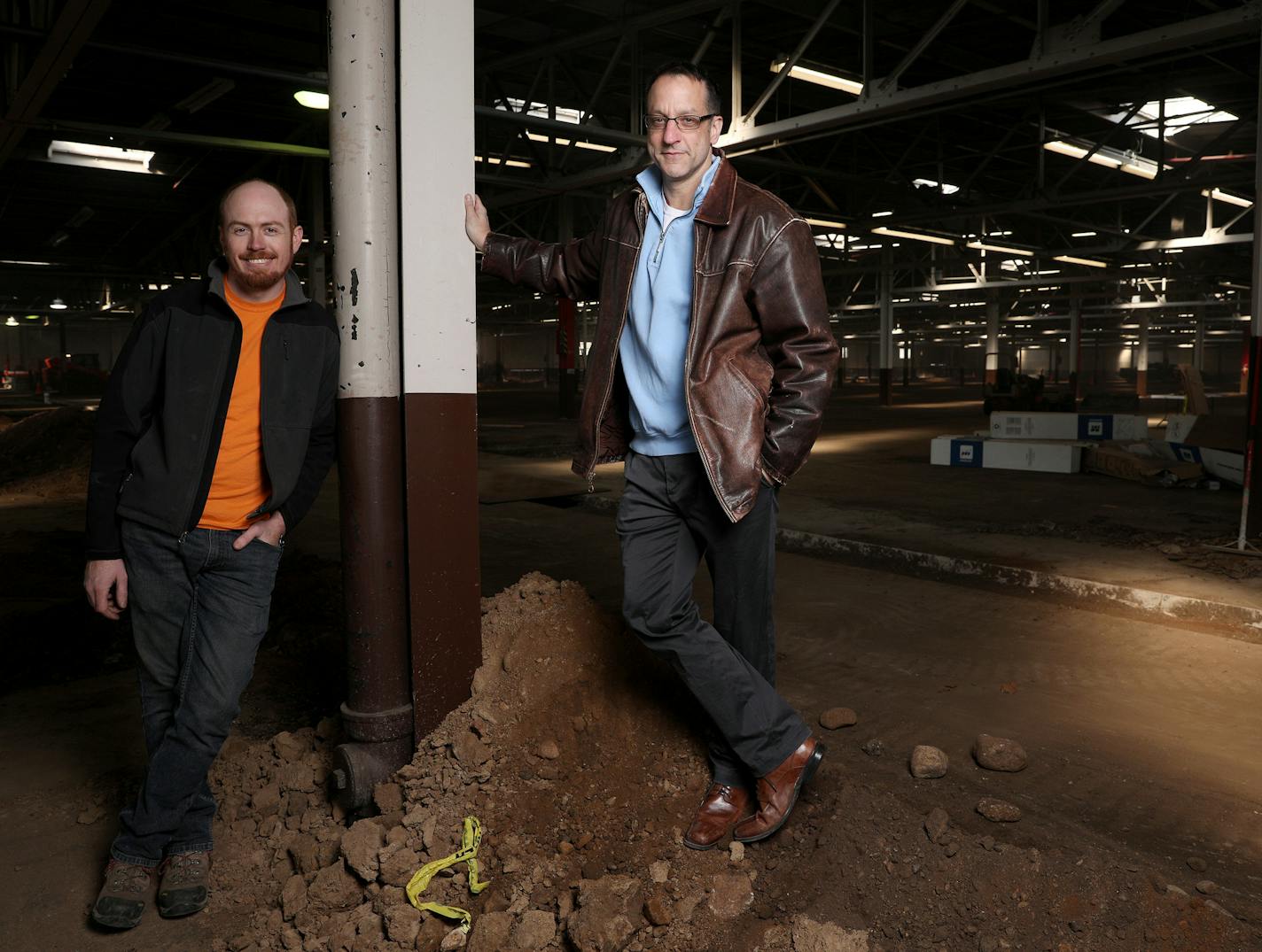 Suntide construction manager Max Currie and business developer Mike Cylkowski stood for a portrait. ] ANTHONY SOUFFLE &#xef; anthony.souffle@startribune.com This week's feature for the Bricks & Mortar page executives from Suntide Commercial visit their latest project, the former Case Machinery industrial warehouse, which they are turning into office space for "creative" work Tuesday, Feb. 27 in St. Paul, Minn.