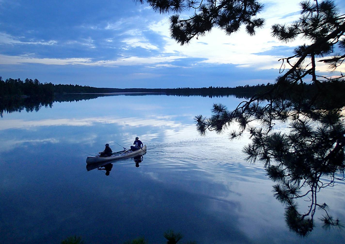 Two men paddle on Conmee Lake back to camp after an evening of fishing in Quetico Provincial Park earlier this month. Conmee Lake is one of the lakes that Canadian officials have restricted access to in order to search for "extreme survivalist " Aaron King, 26.