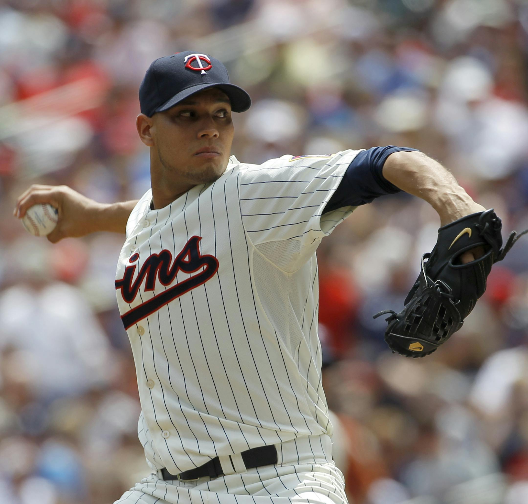 Minnesota Twins starting pitcher Yohan Pino delivers to the New York Yankees during the first inning of a baseball game in Minneapolis, Saturday, July 5, 2014. (AP Photo/Ann Heisenfelt)