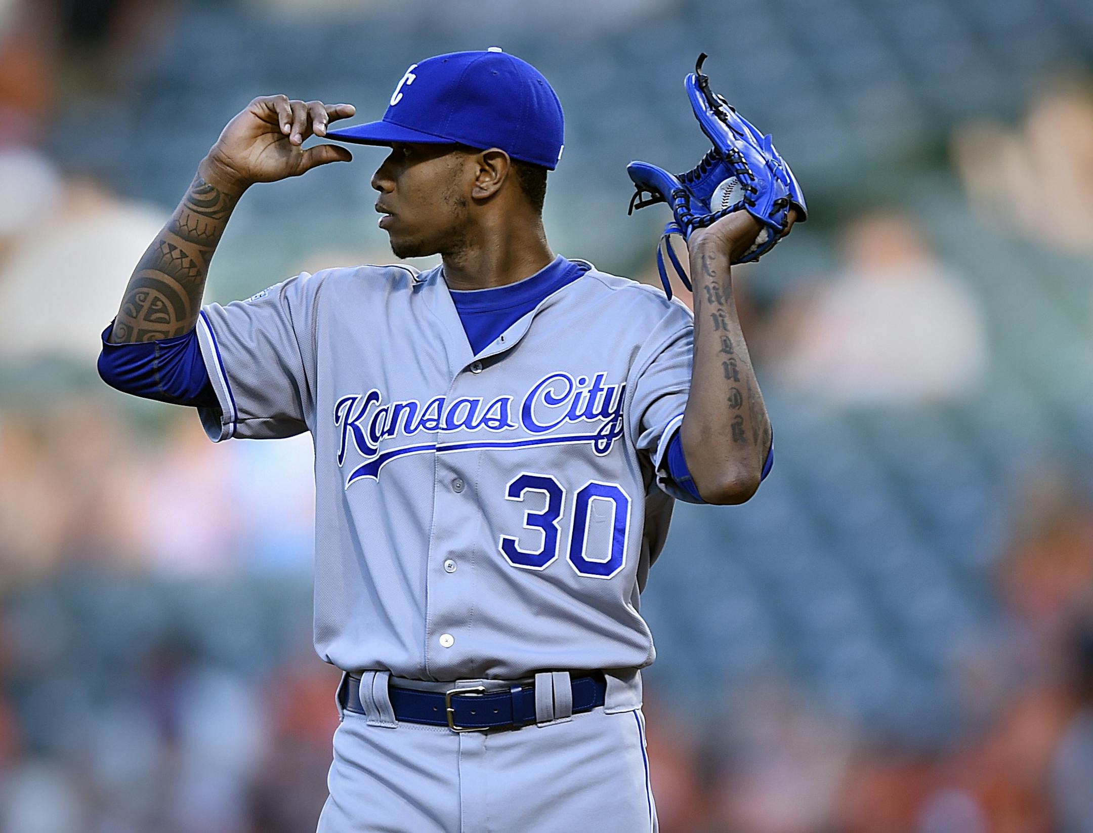 Kansas City Royals pitcher Yordano Ventura pauses after giving up four runs to the Baltimore Orioles in the first inning of a baseball game, Tuesday, June 7, 2016, in Baltimore. (AP Photo/Gail Burton)