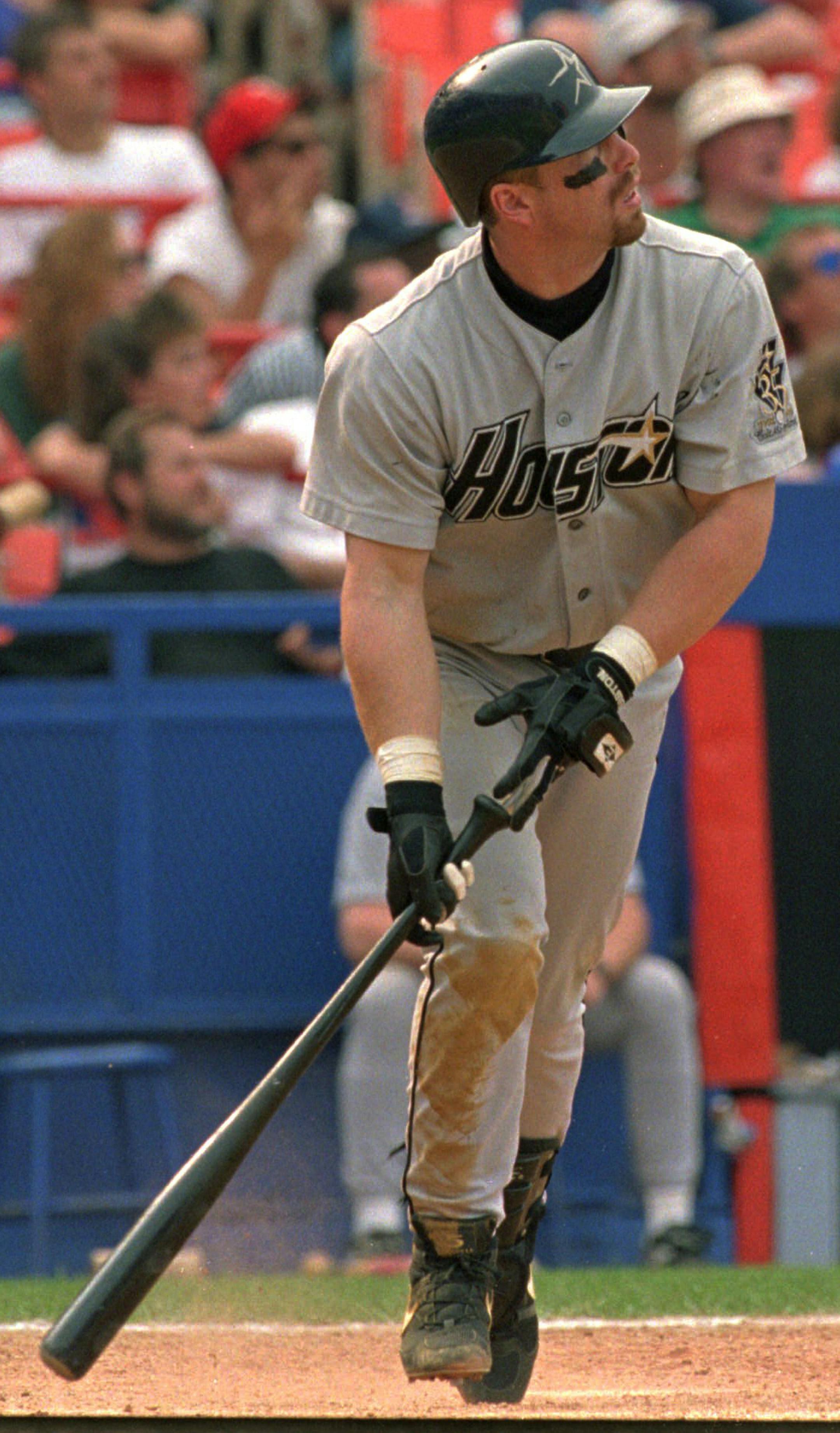 Houston Astros batter Jeff Bagwell watches his game-winning solo home run sail over the left field wall in the 11th inning of the first game of a double header against the New York Mets at Shea Stadium in New York Sunday, July 14, 1996. The Astros defeated the Mets 7-5 after Bagwell's homer and Derek Bell's double drove in runner Mike Simms.(AP Photo/Kathy Willens) ORG XMIT: NYS103
