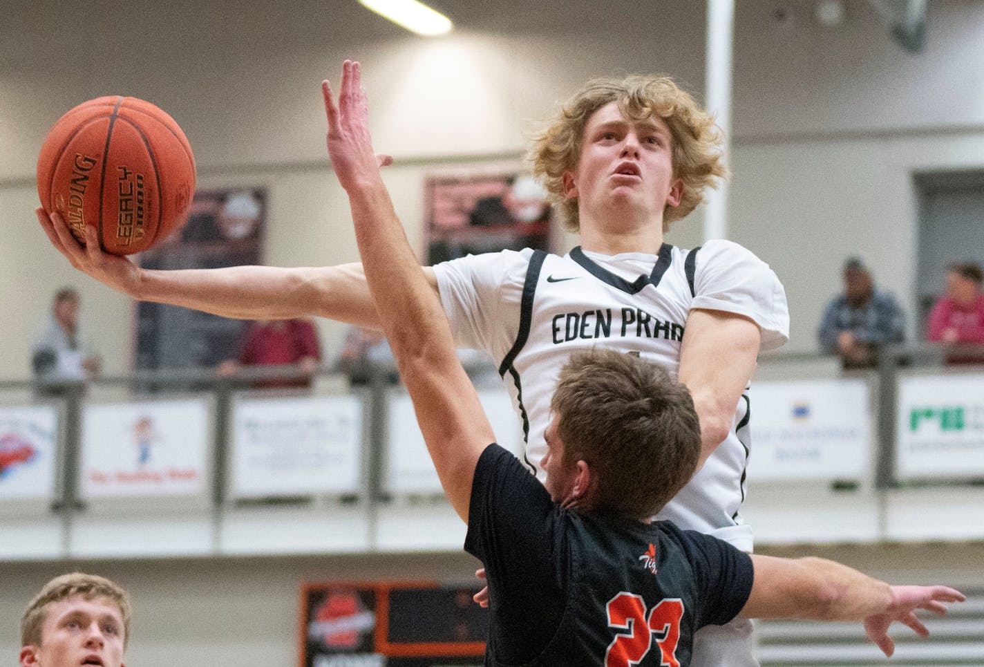 Eden Prairie wing Max Lorenson (1) attempts a shot over Farmington forward Connor Todd (23) in the second half Friday, Dec. 16, 2022 at Farmington High School in Farmington, Minn. ]