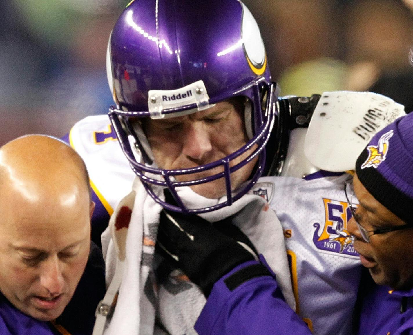 Minnesota Vikings quarterback Brett Favre was helped off the field after suffering an injury late in the fourth quarter against the New England Patriots at Gillette Stadium in Foxborough, Massachusetts, Sunday, October 31, 2010. The Patriots won, 28-18. (Jerry Holt/Minneapolis Star Tribune/MCT) ORG XMIT: MIN2015022217053540 ORG XMIT: MIN1502221712282939