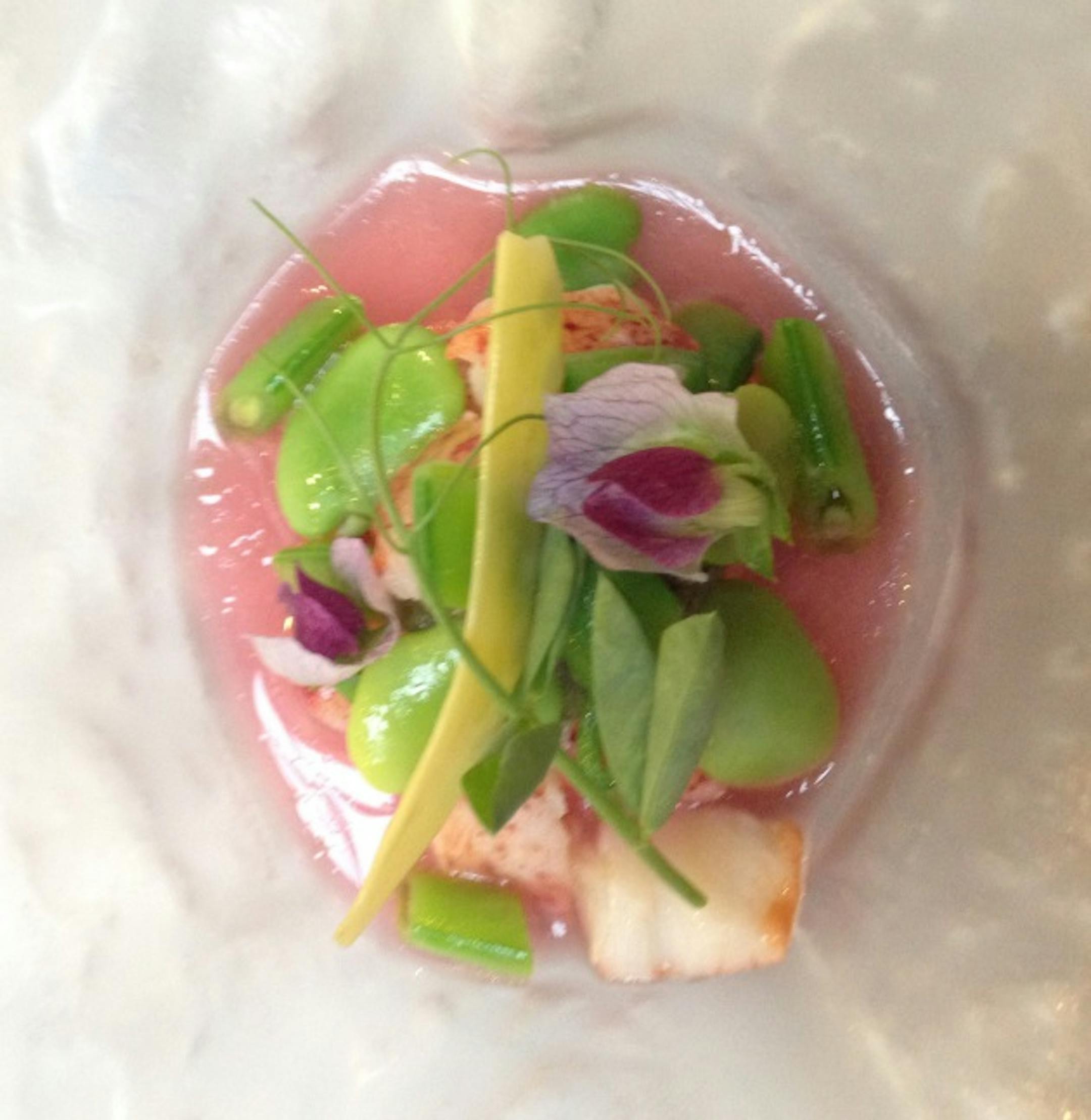 Spring peas and lobster with rhubarb and green tomato salsa