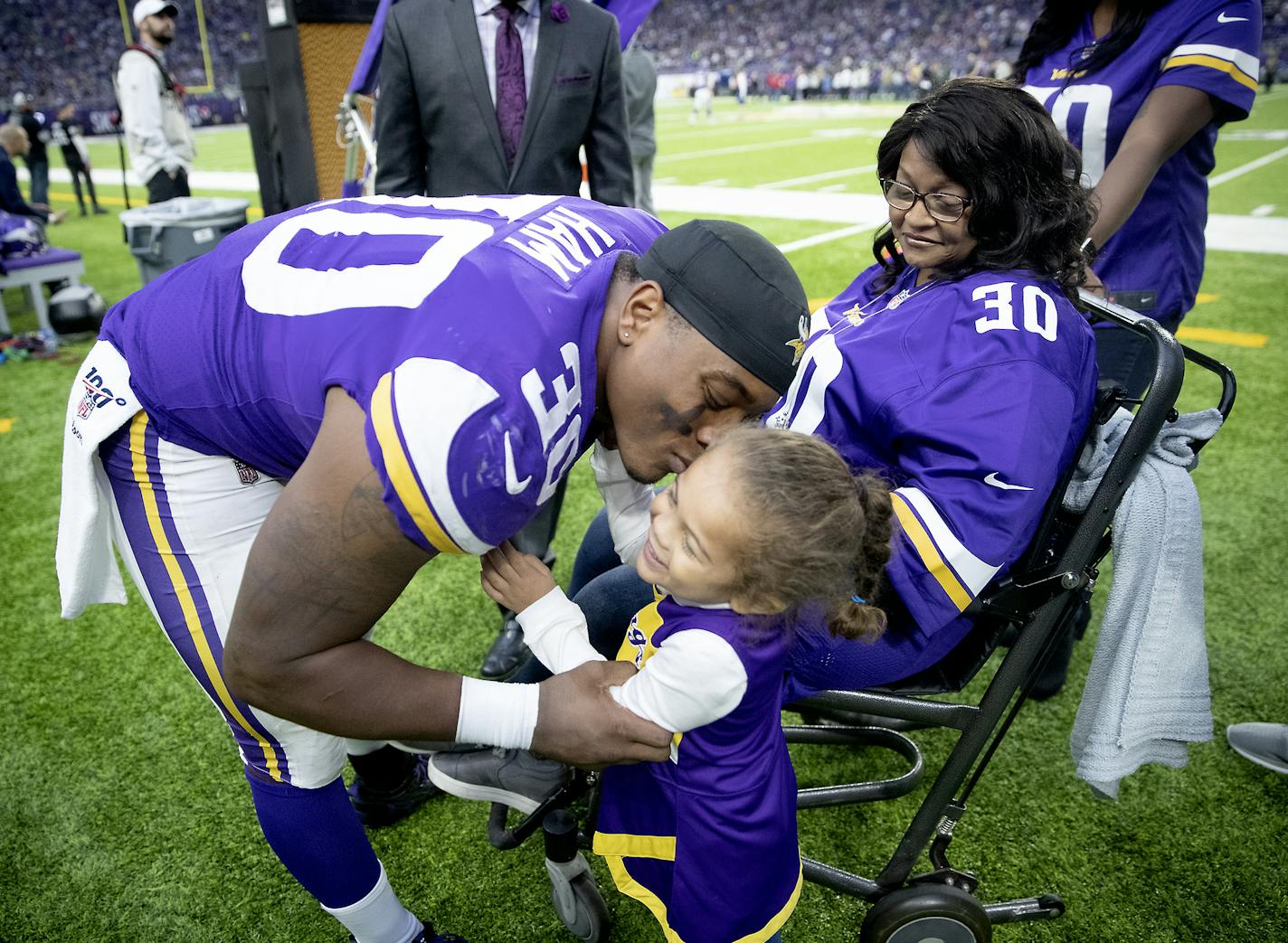 Minnesota Vikings fullback C.J. Ham's honored his mother during half time Dec. 8 at U.S. Bank Stadium. He gave daughter Skylar, 3, a kiss. ] ELIZABETH FLORES &#x2022; liz.flores@startribune.com